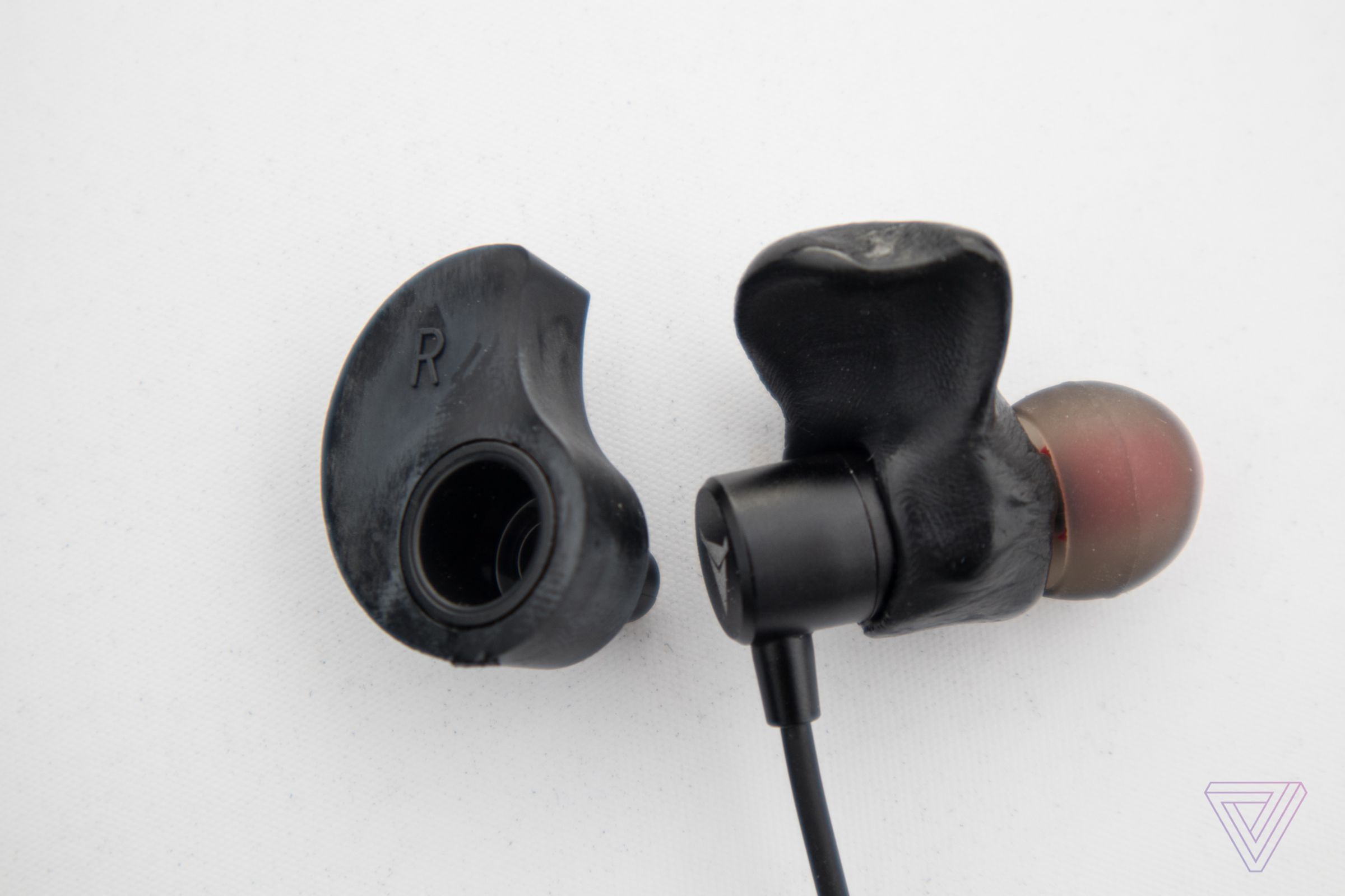 The Decibullz earbud wings before and after.