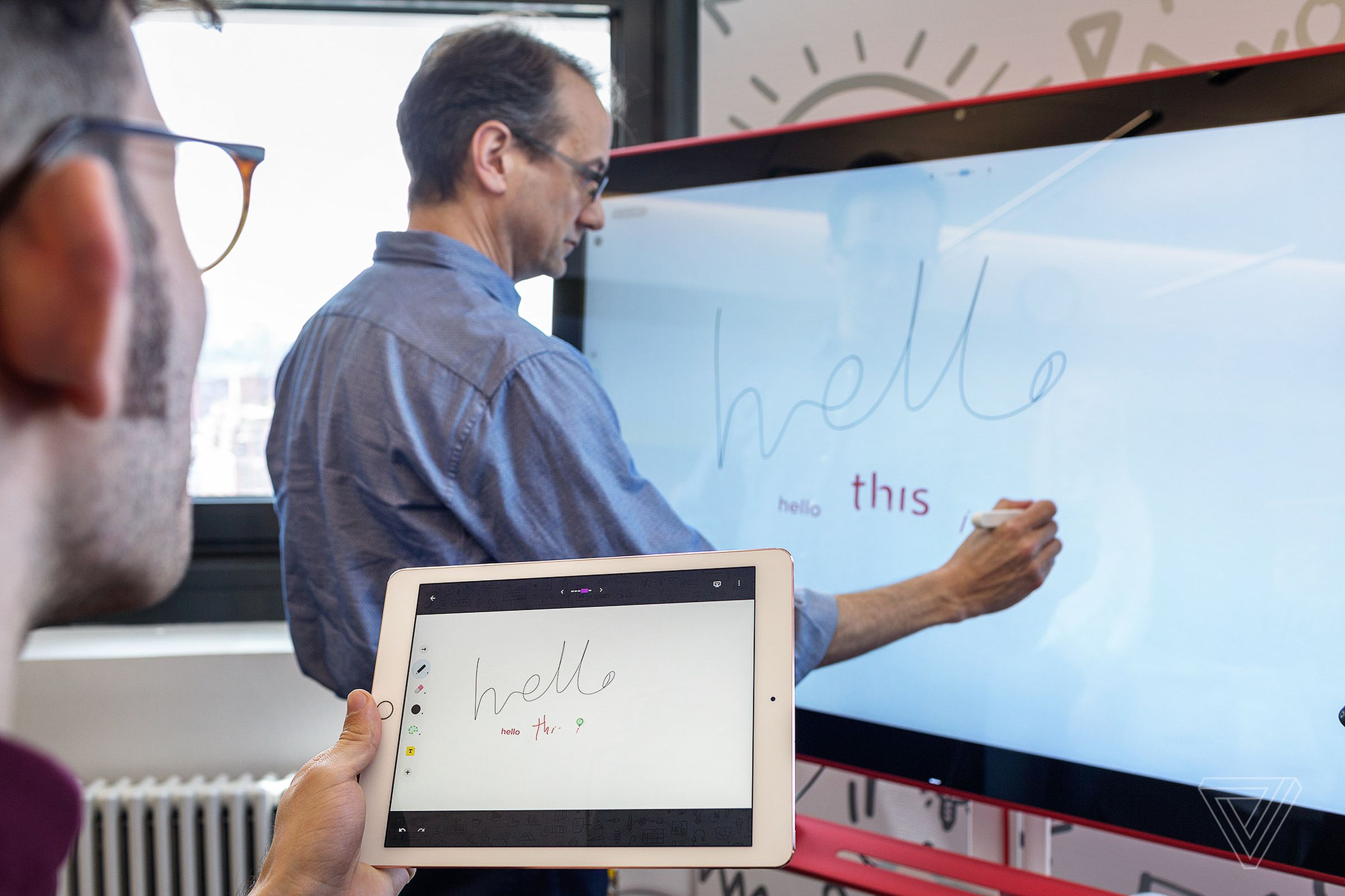 Above: Jonathan Rochelle, director of product management at Google, demoes the Jamboard.