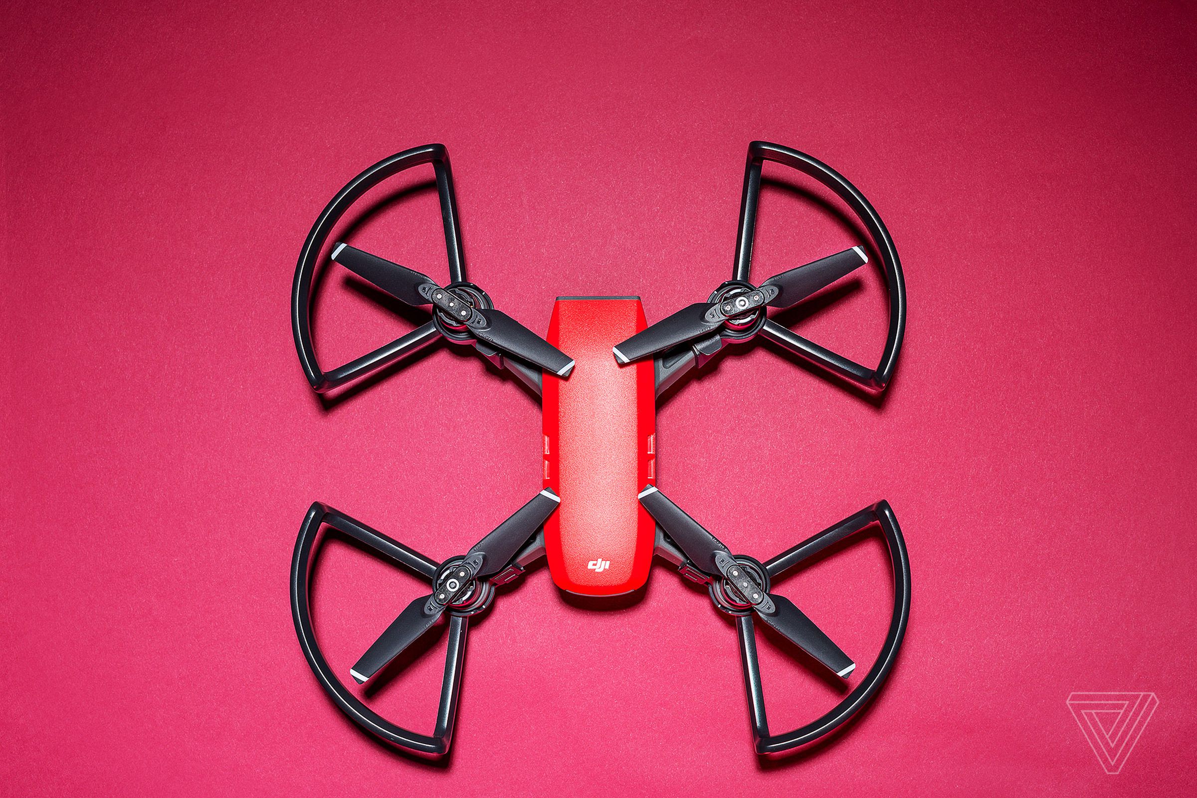 DJI Spark drone top down on red background