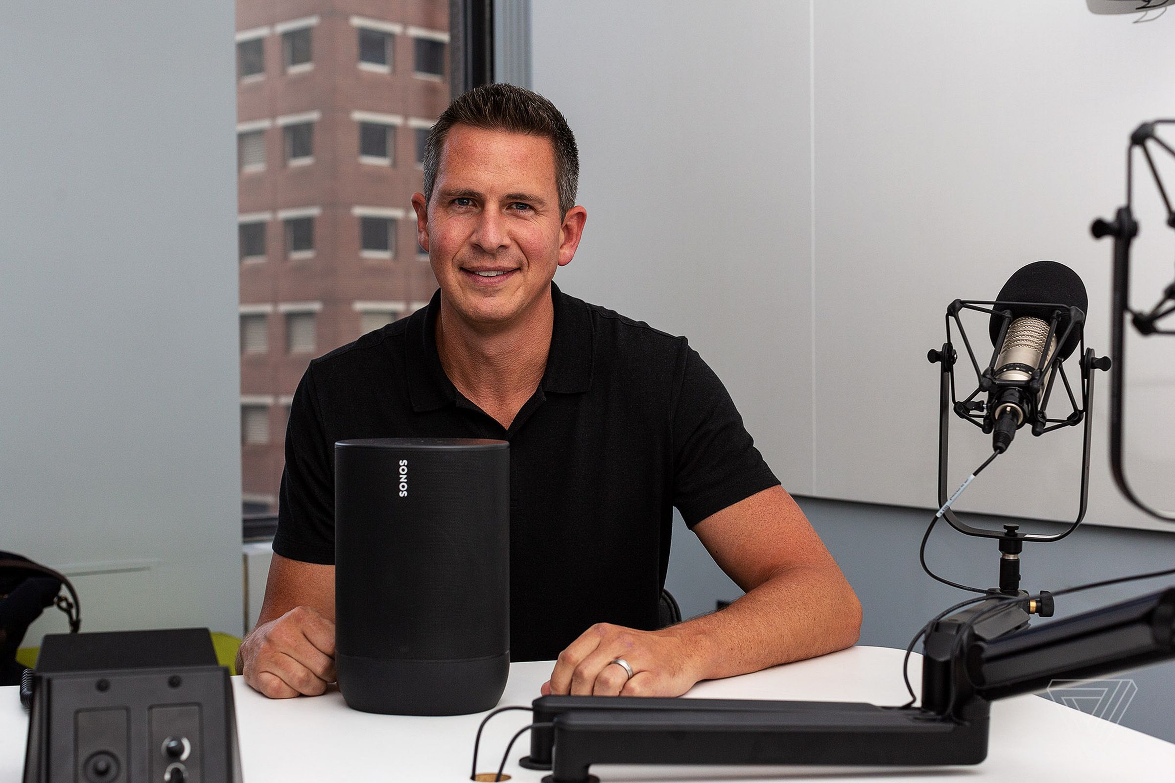Sonos CEO Patrick Spence in August 2019, showing the then-new Sonos Move speaker.