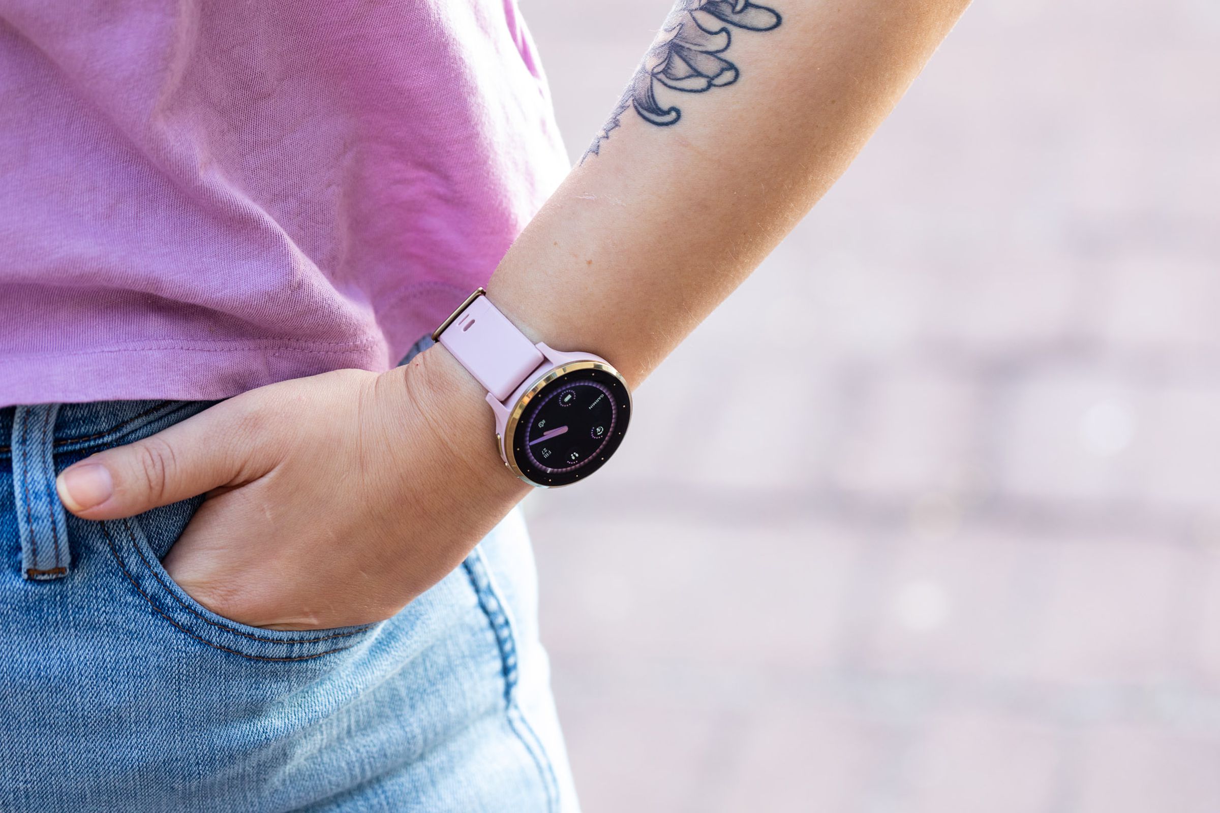 Person wearing the Garmin Venu 3S while putting their hand in a jeans pocket.