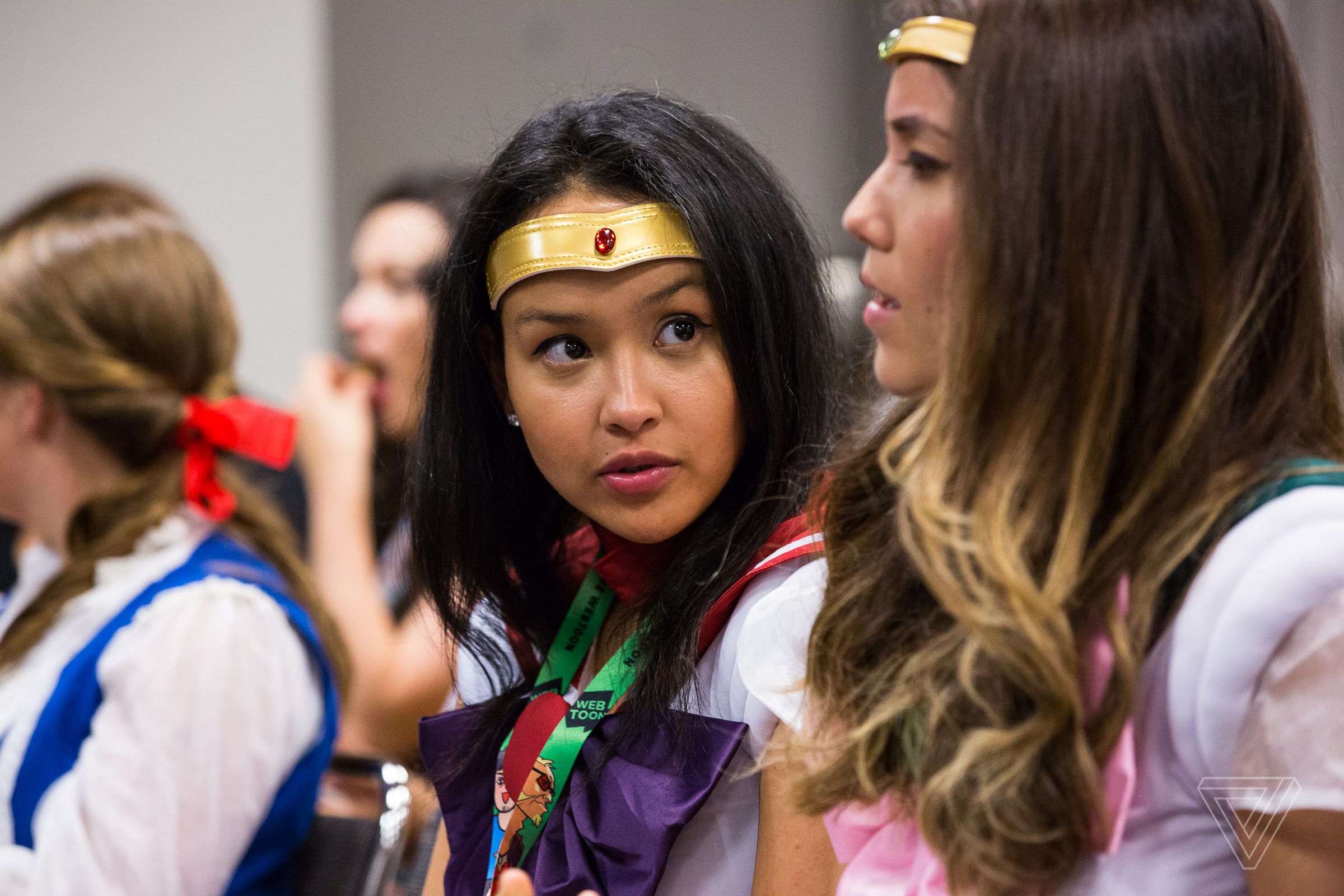 Audience members dressed in cosplay as members of the Sailor Moon franchise at the Women of Color Break Out the Books panel at the New York Comic Con 2017.