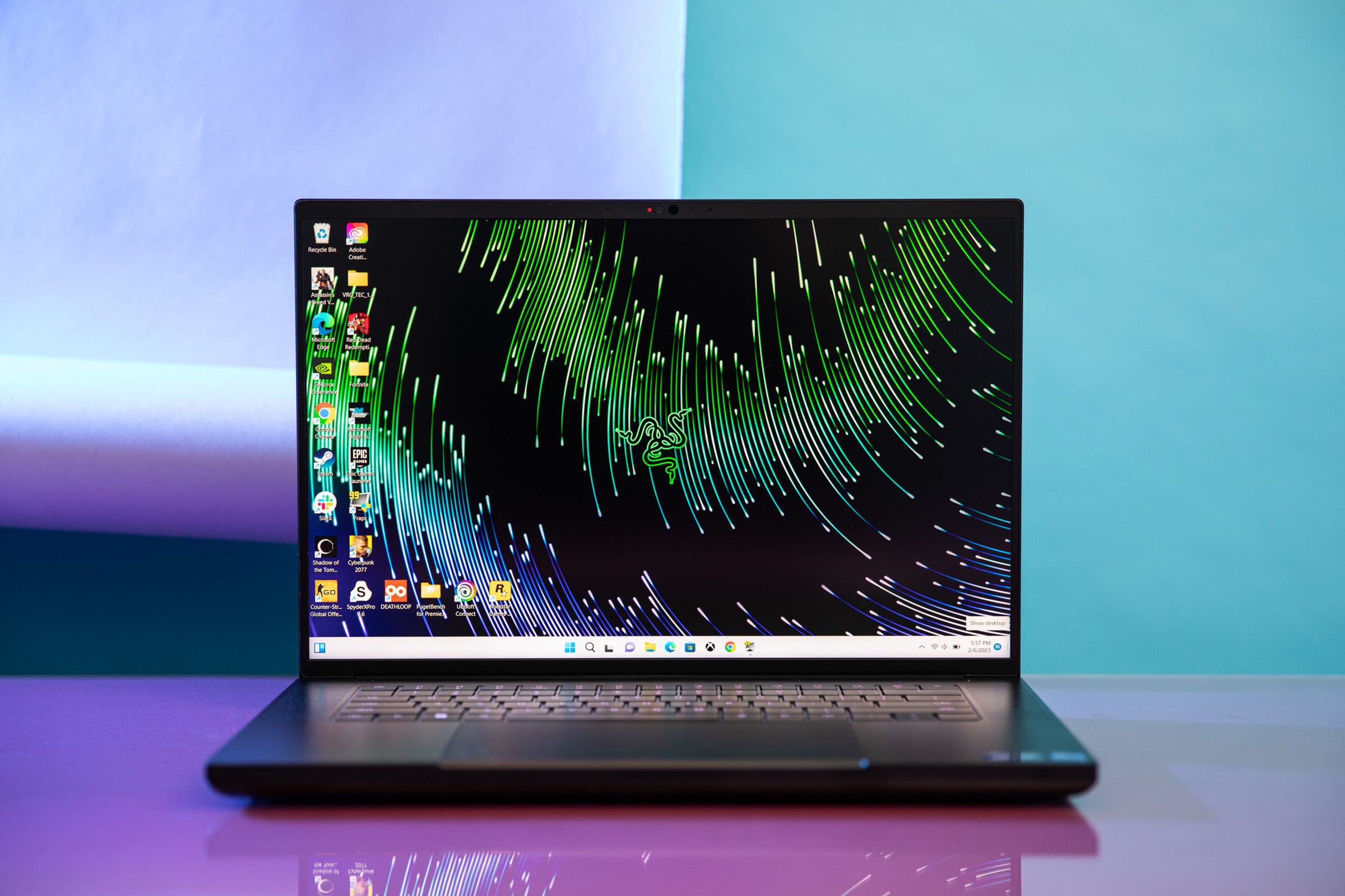 The Razer Blade 16 displaying the desktop.