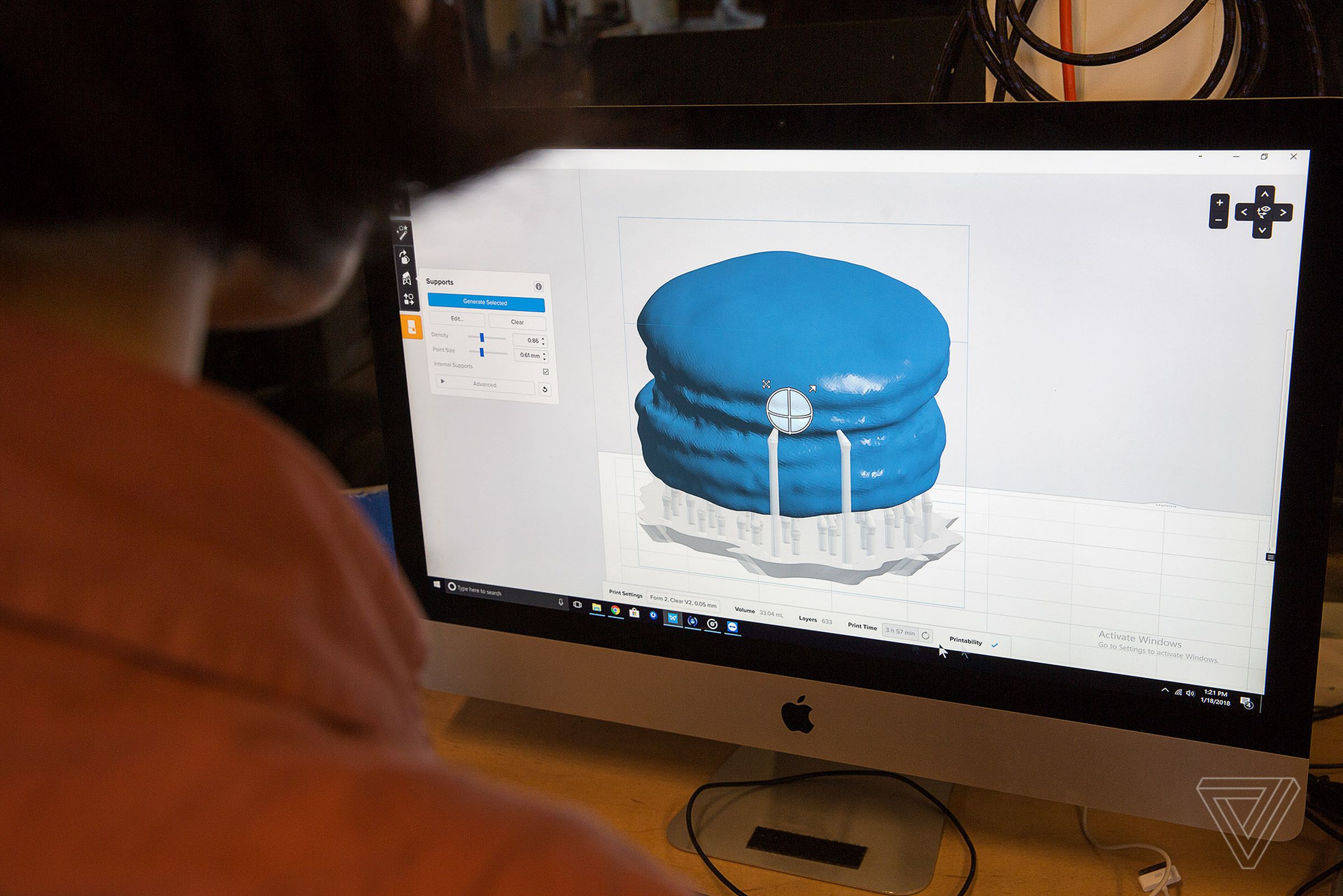 Yu prepares a file for 3D printing.