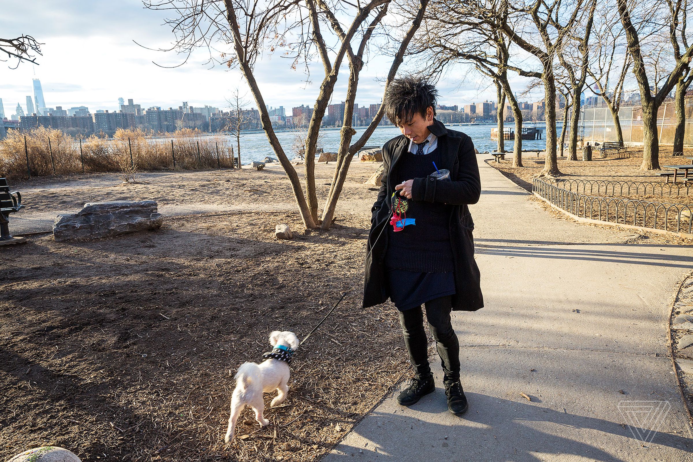 Brad Kim with his dog Mugatu in Grand Street Park in Williamsburg, New York.