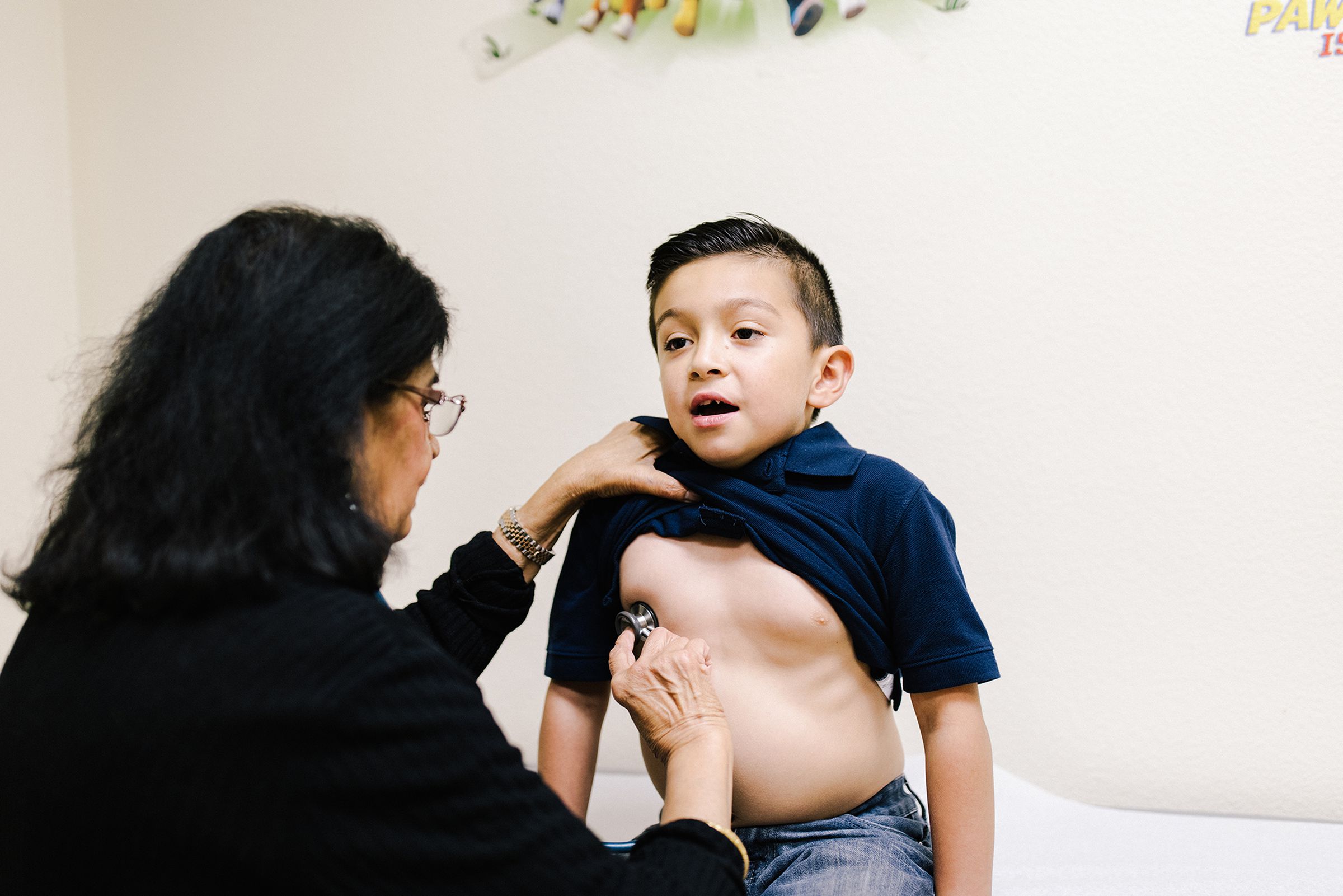 Benito Rodriguez, age 6, gets a check-up after being hospitalized for several days at El Centro Regional Medical with a virus that triggered his asthma.