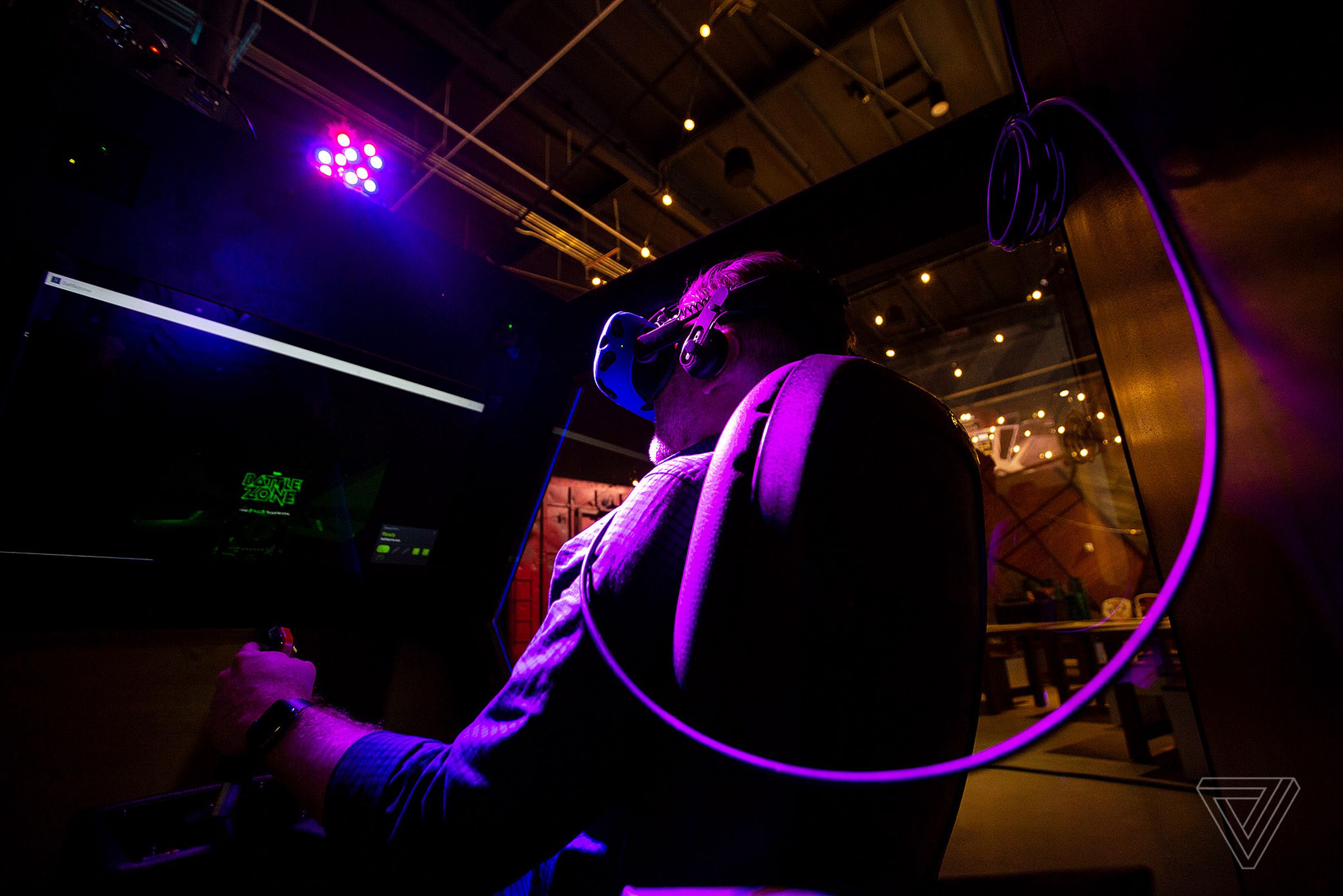 Bryan Bishop plays Battlezone VR in a motion-simulator pod.