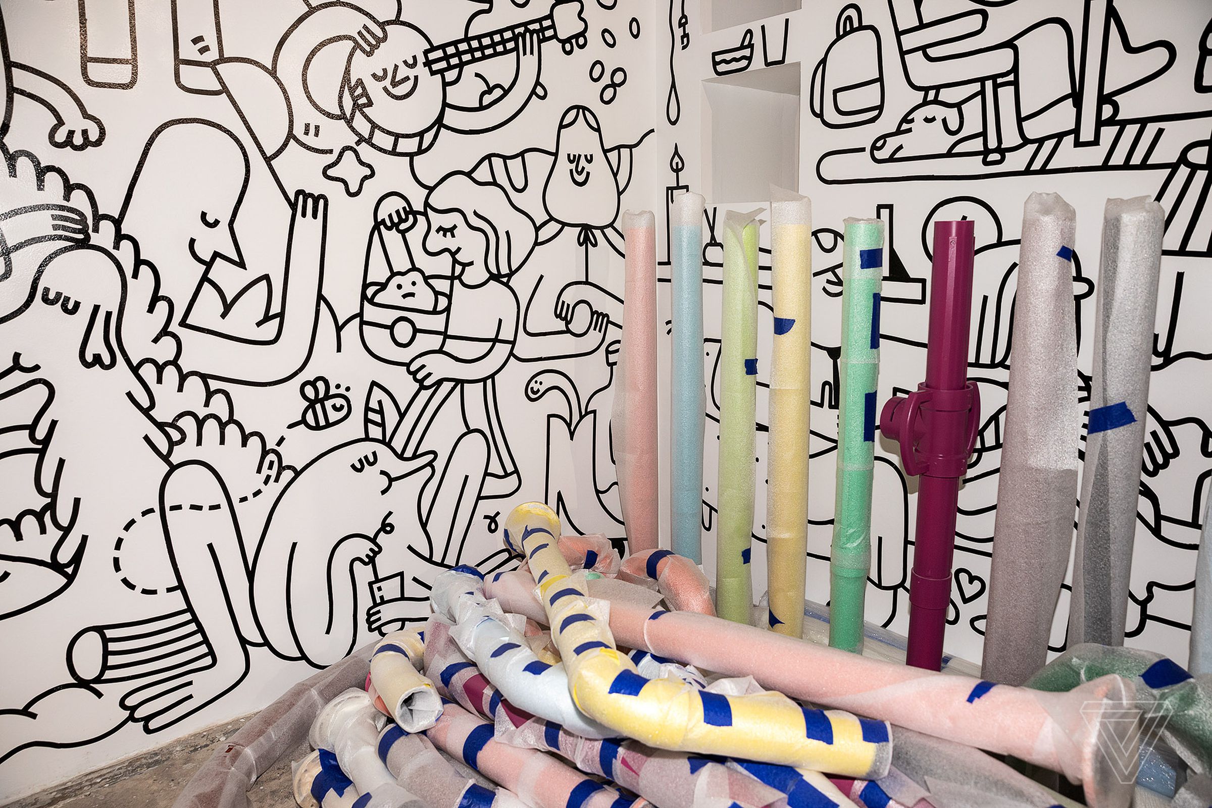 Visitors of the “Color Me ___” room are encouraged to use oversized markers to draw on the walls.
