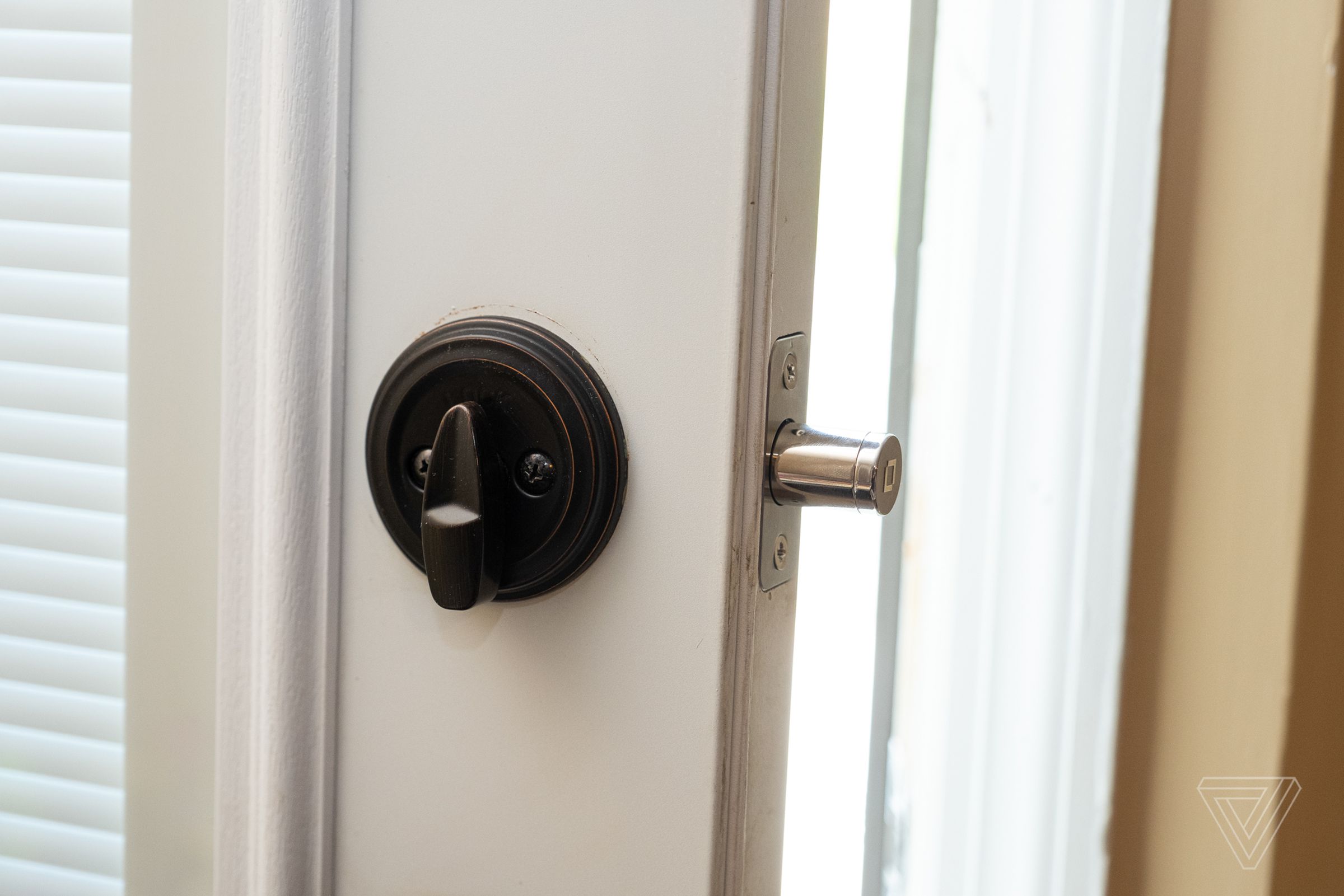 A deadbolt lock with the Level Lock installed