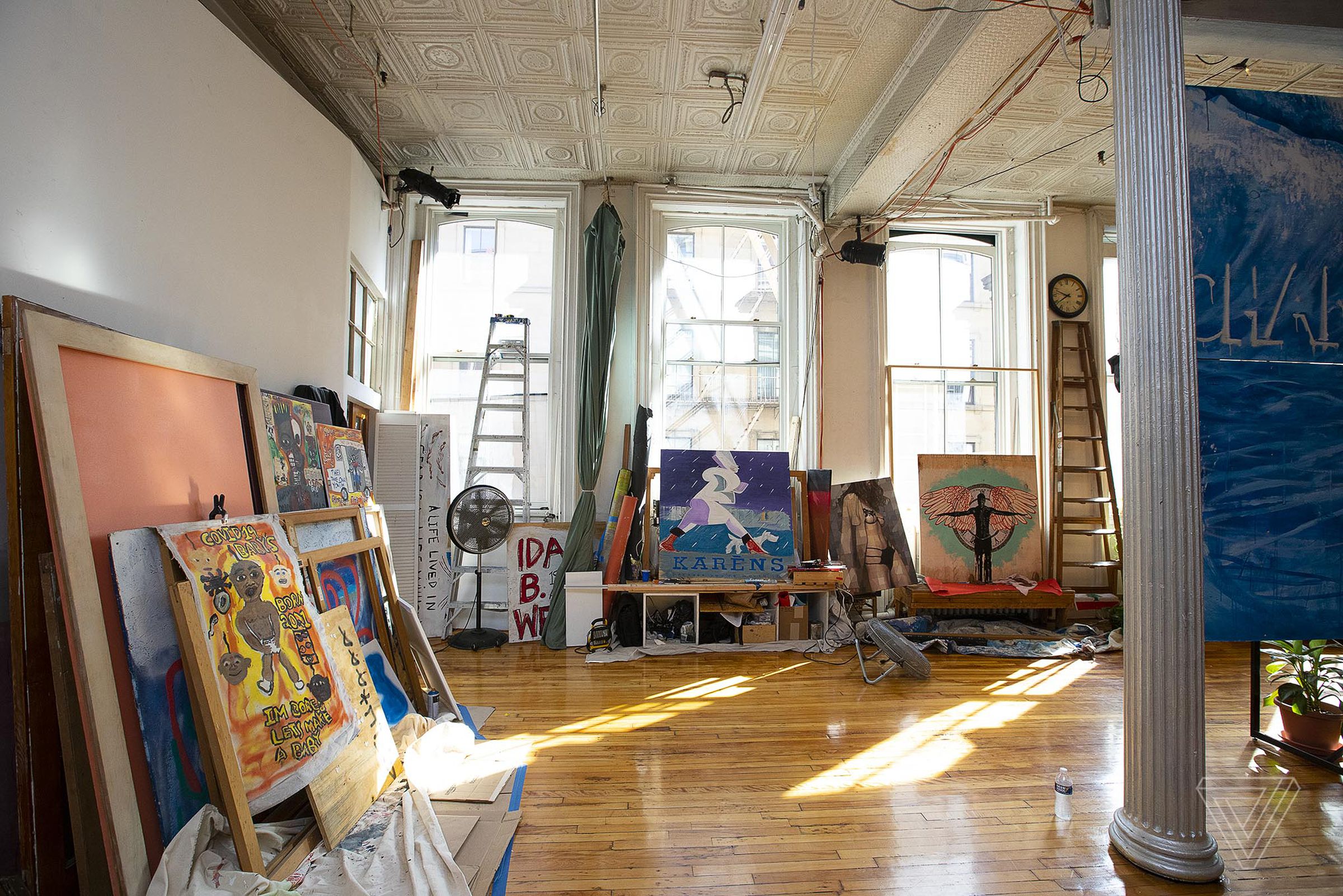 Trevor Croop’s studio loft space in SoHo stored dozens of pieces of artwork that he and other artists saved as businesses opened back up and took down painted boards.
