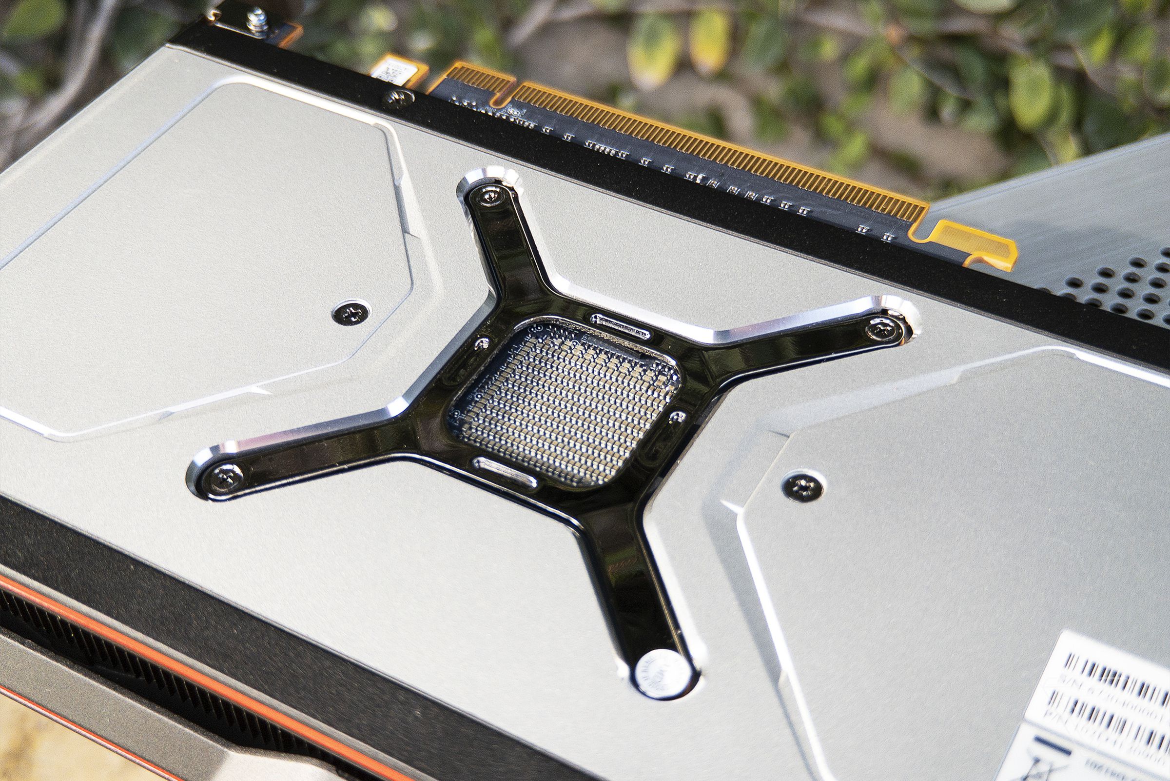 The RX 6800’s backplate, with exposed Phillips head screws.