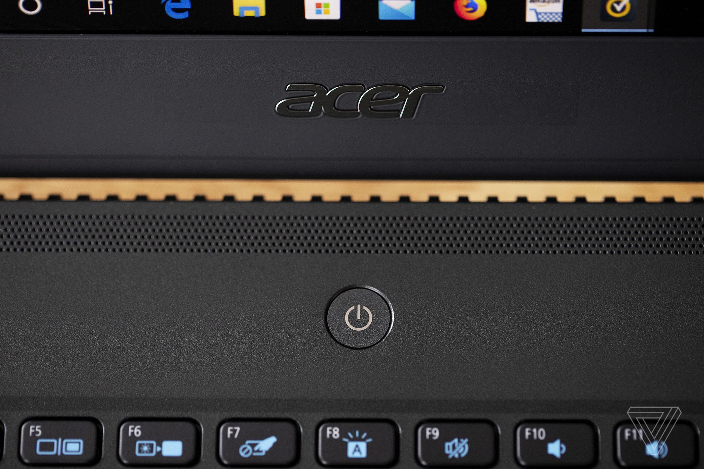 The Acer logo and power button on the Acer TravelMate P6.