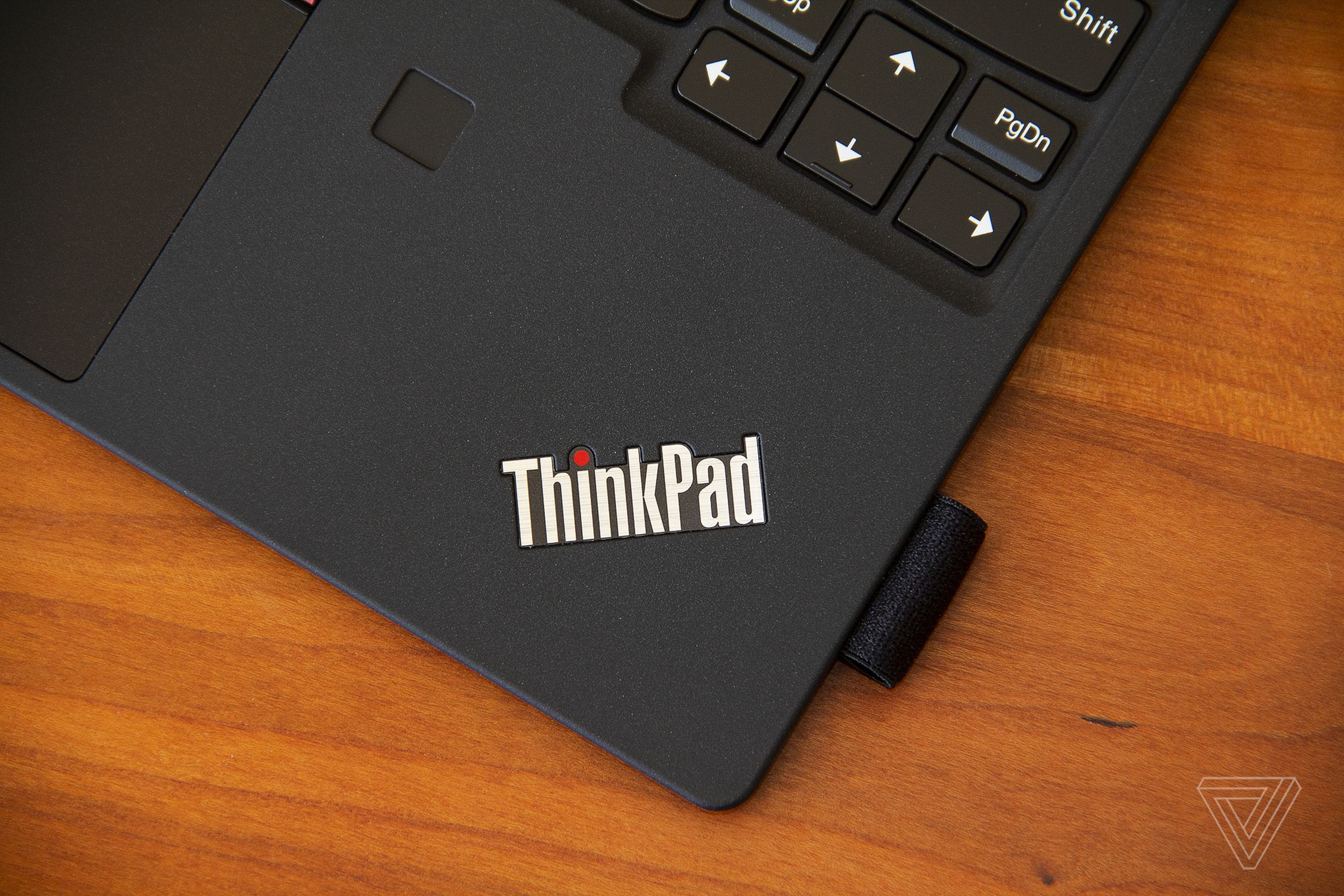 The ThinkPad logo on the bottom right corner of the ThinkPad X12 Detachable keyboard deck.