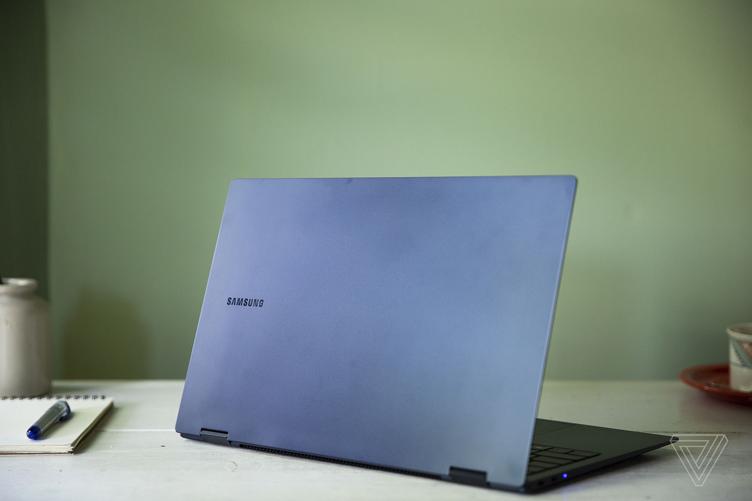 The Samsung Galaxy Book Pro 360 (15-inch) open, seen from the back, angled slightly to the left. 