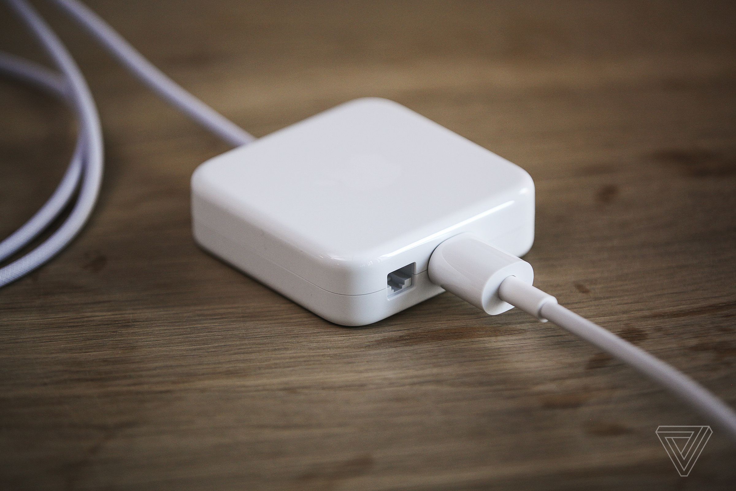 The power adapter is now external, like a MacBook, but it conveniently includes an Ethernet port
