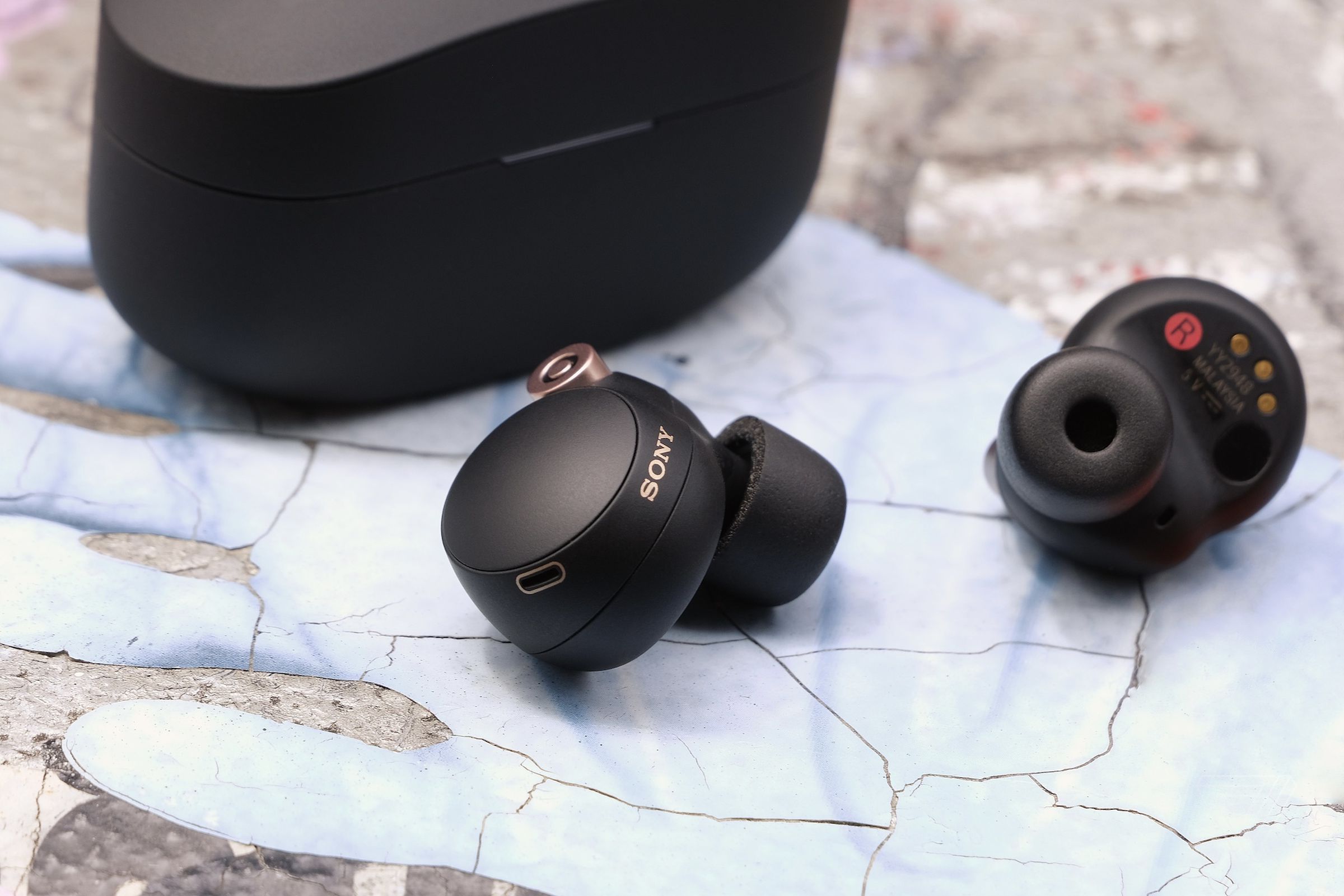 The earbuds have beamforming mics and bone conduction sensors for improved voice calls.