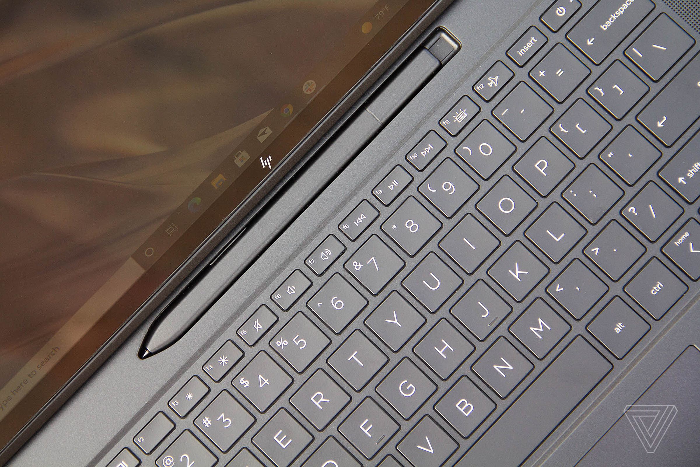 The HP Elite Folio stylus and top bezel angled to the left, seen from above.