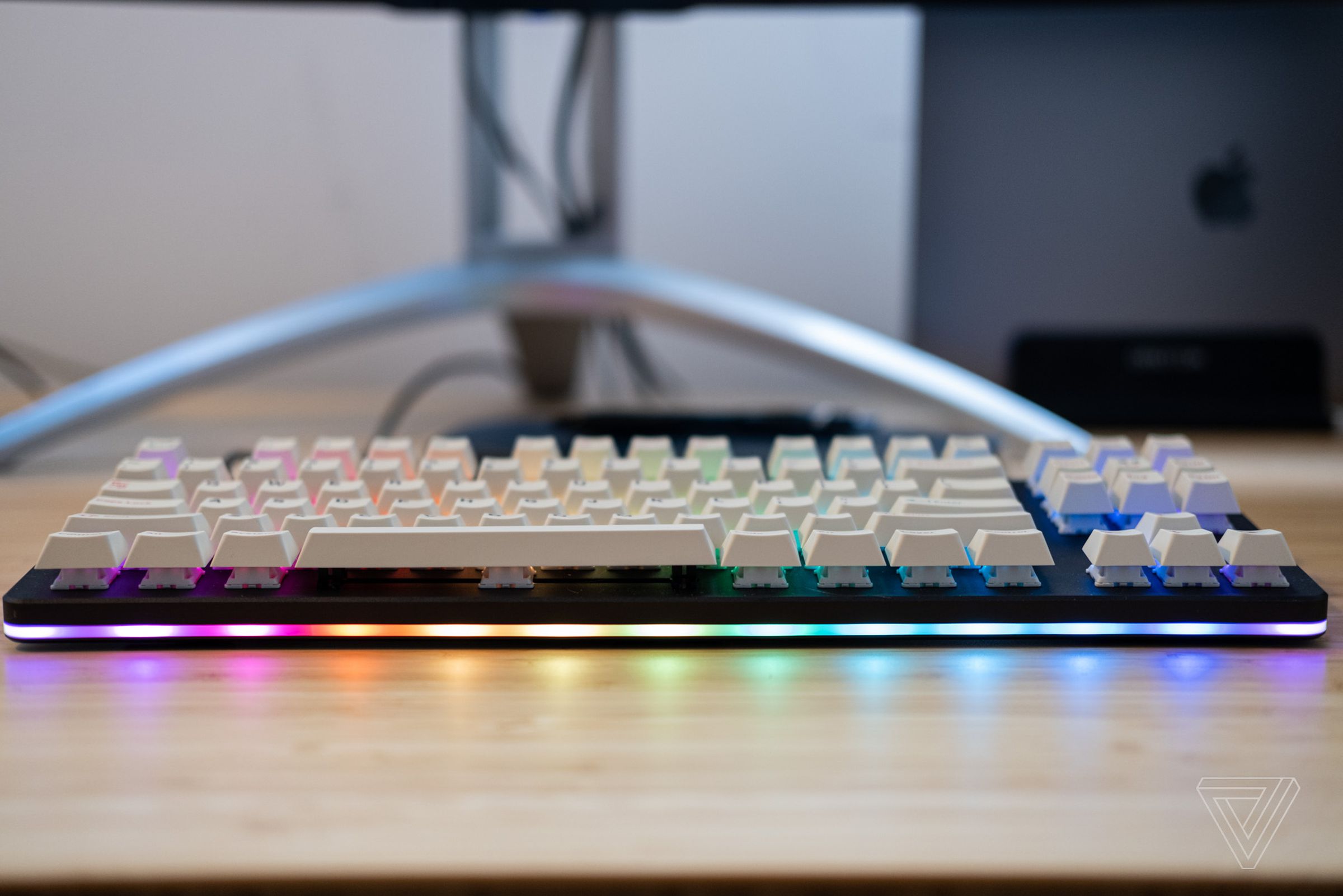 RGB lighting shines out the sides of the keyboard.