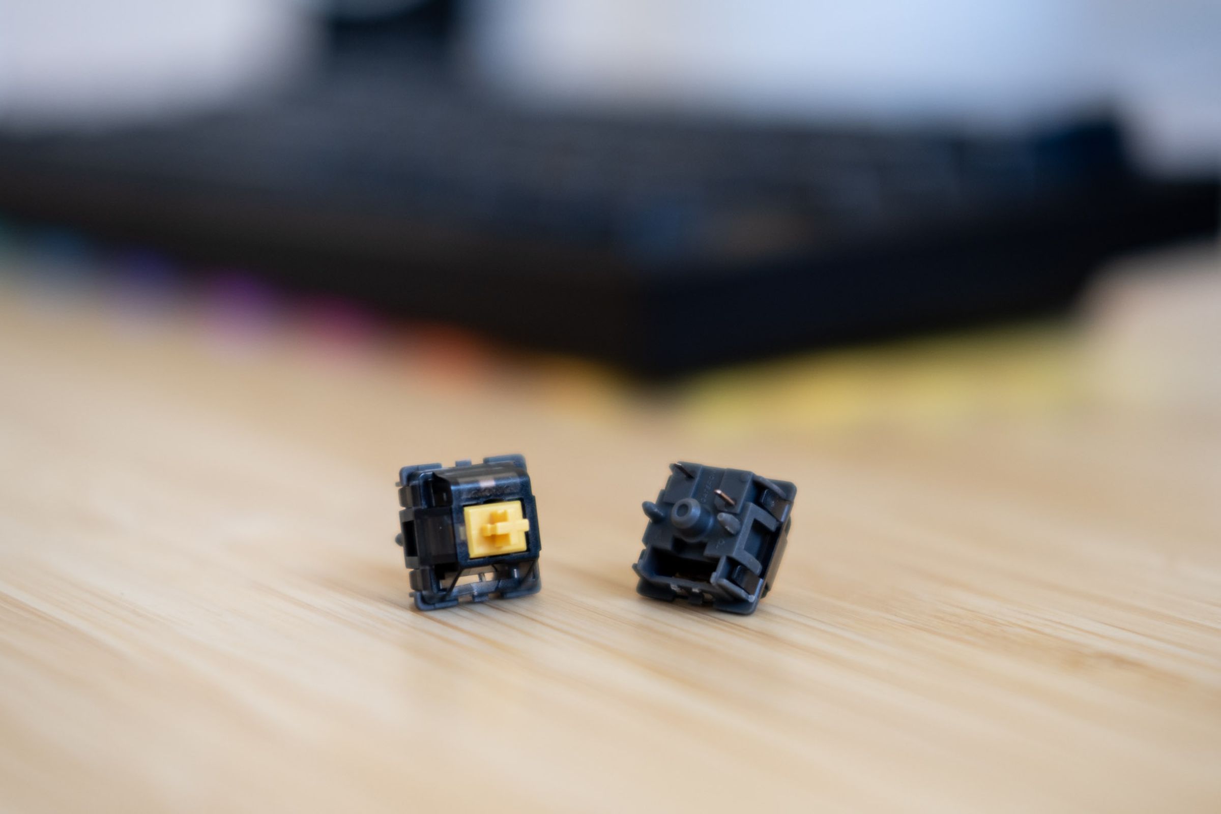Two Holy Panda switches on a desk.