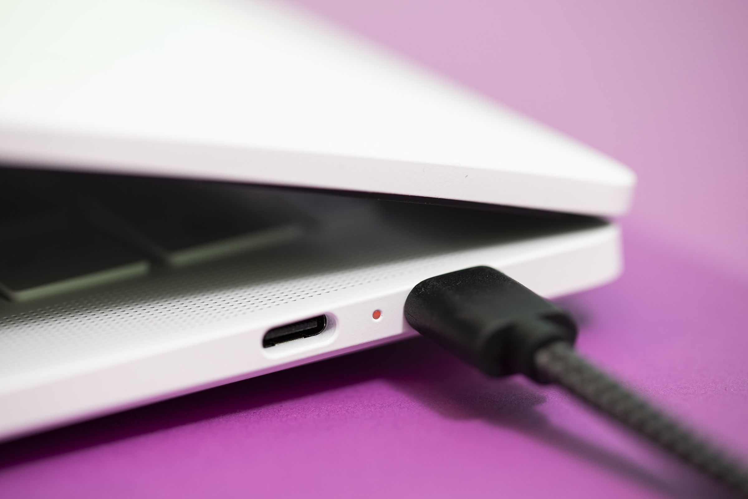 A charger plugged into the HP Dragonfly Pro Chromebook.