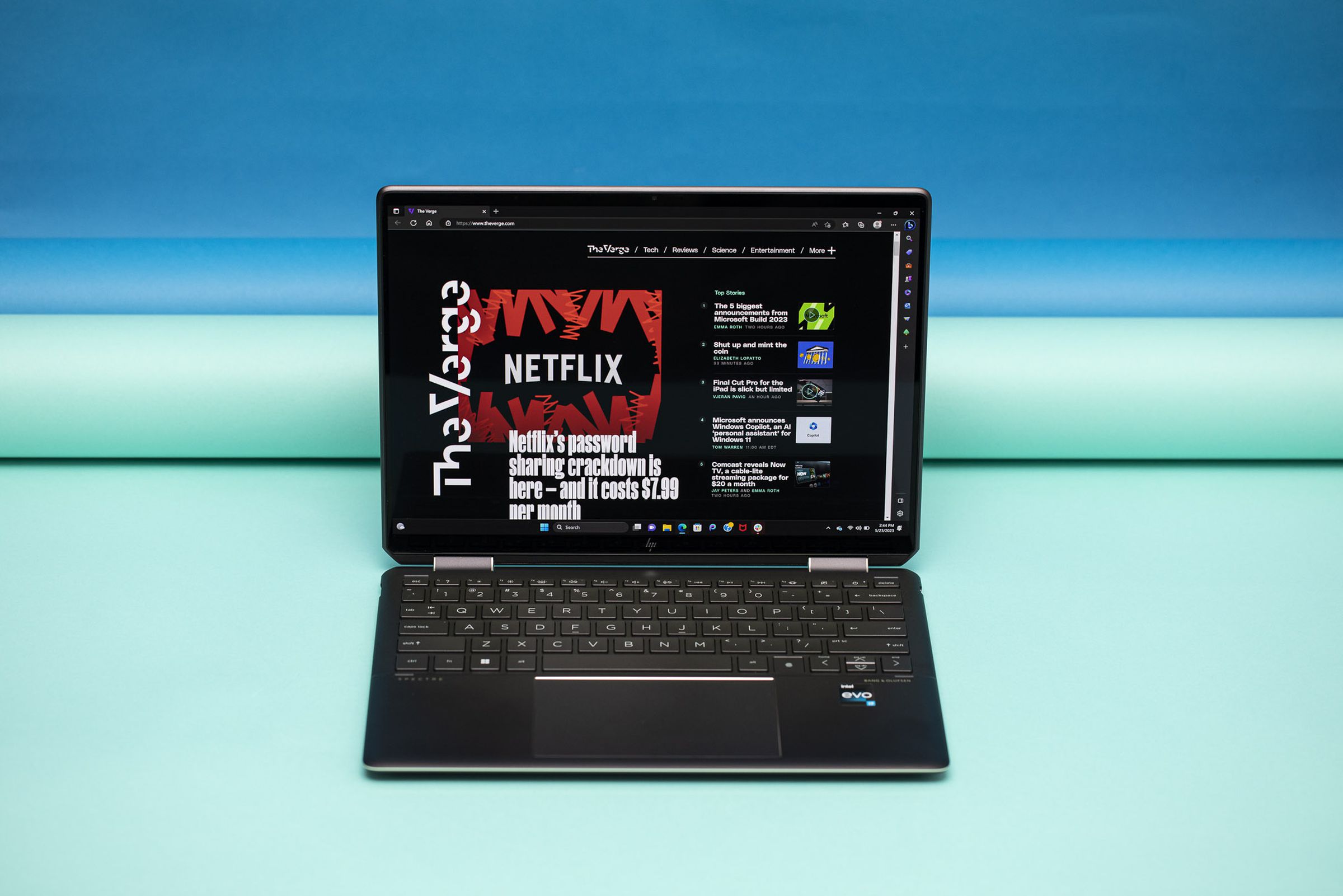 The HP Spectre x360 13.5 displaying The Verge homepage seen from above.