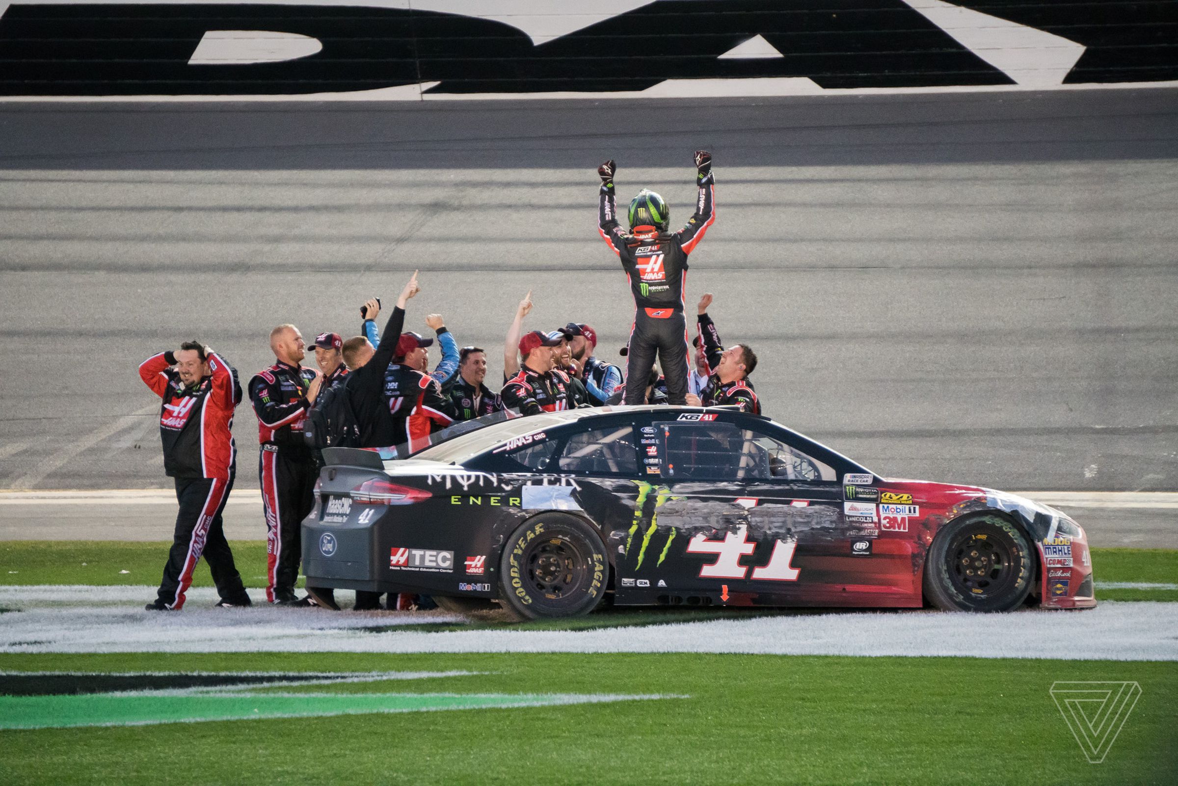 From top: (1) Kaz Grala, 18, celebrates winning the NextEra Energy Resources 250. He became the youngest winner ever in NASCAR’s top three series. (2) Ryan Reed climbs out of his car after winning the Xfinity series race at Daytona. His last — and only other — win was the same race at Daytona in 2015. (3) Kurt Busch celebrates his Daytona 500 win with his teammates. Busch sustained heavy damage and still was able to take home his first ever 500 win.