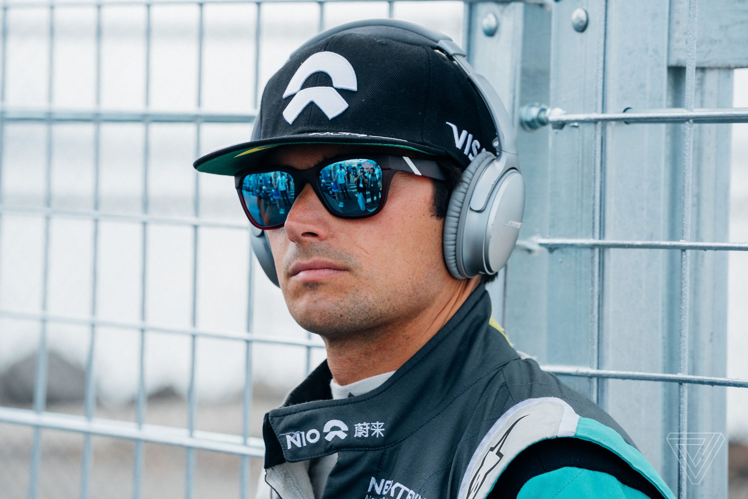 Season 1 champion Nelson Piquet, Jr. uses a pair of Bose noise-canceling headphones to muffle the noise on the starting grid.