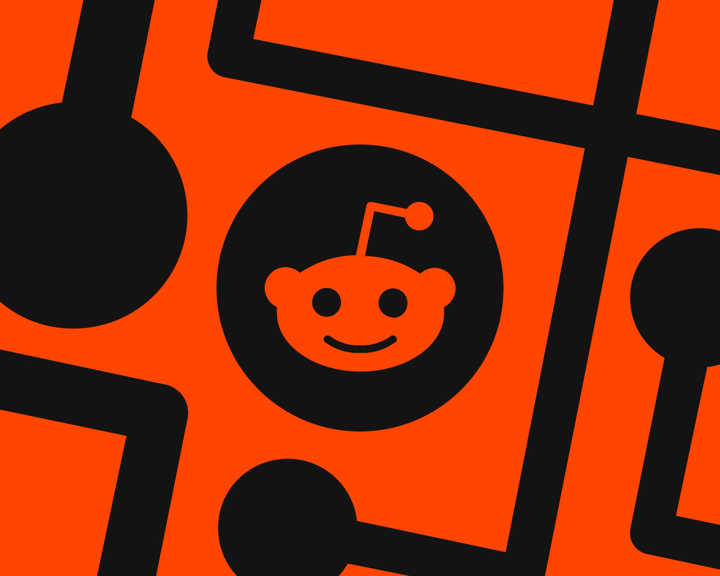 The Reddit logo over an orange and black background