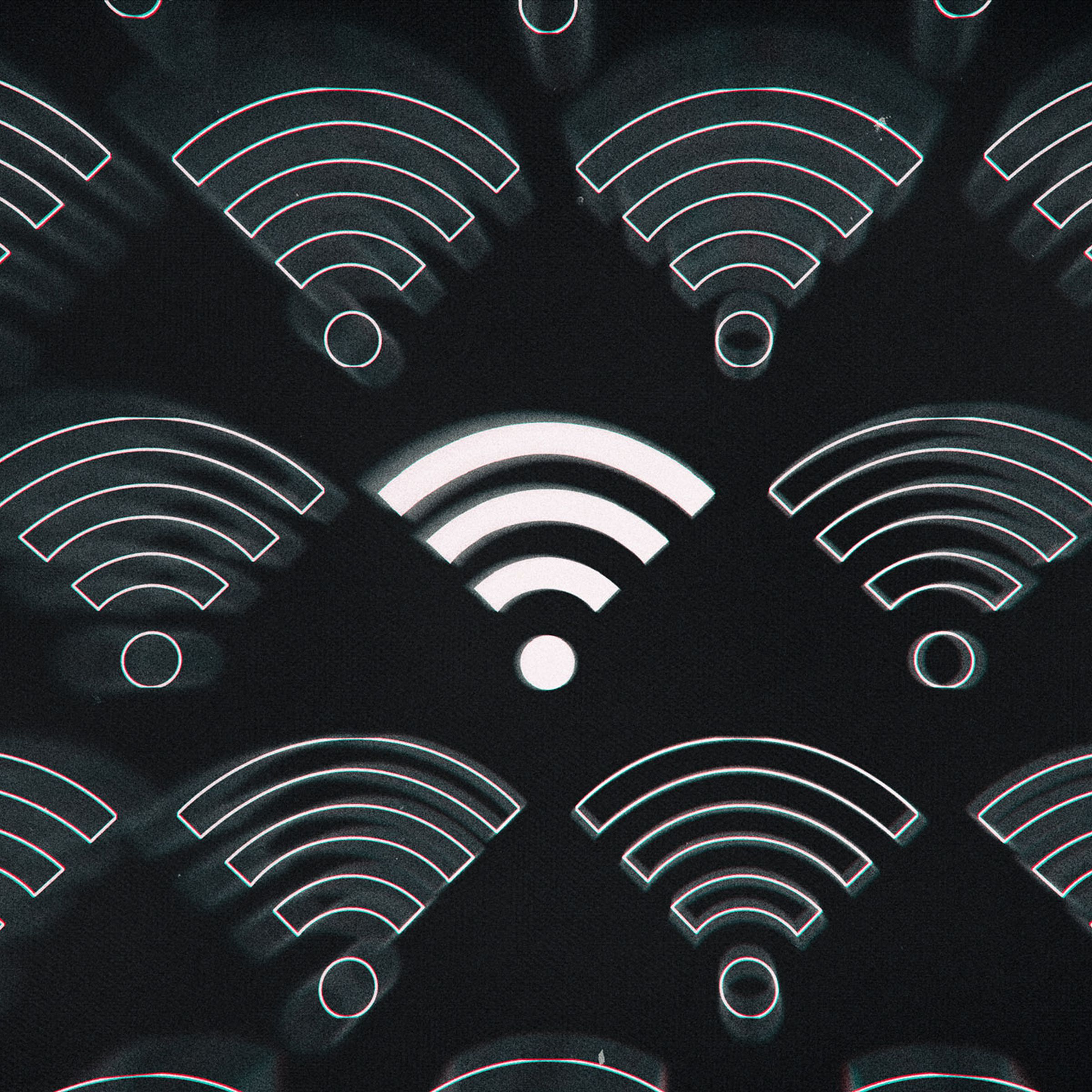 Illustration of several Wi-Fi symbols, one filled in with white, the others just outlines.