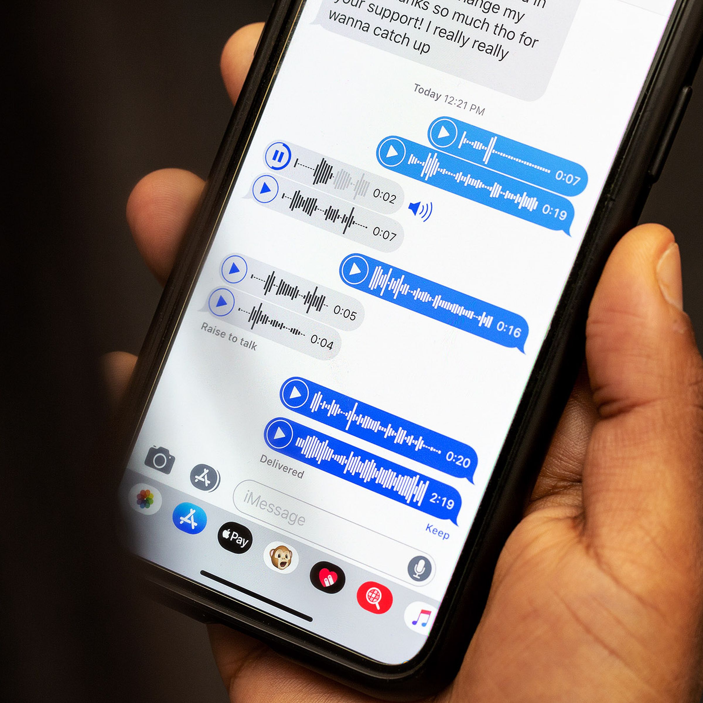 A photo showing someone use iMessage to record a voice message.