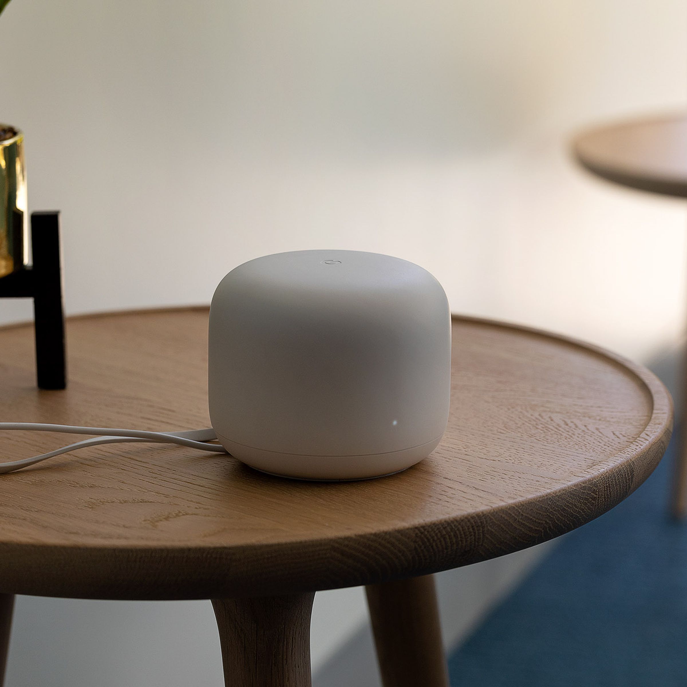 Google Home device on a side table.