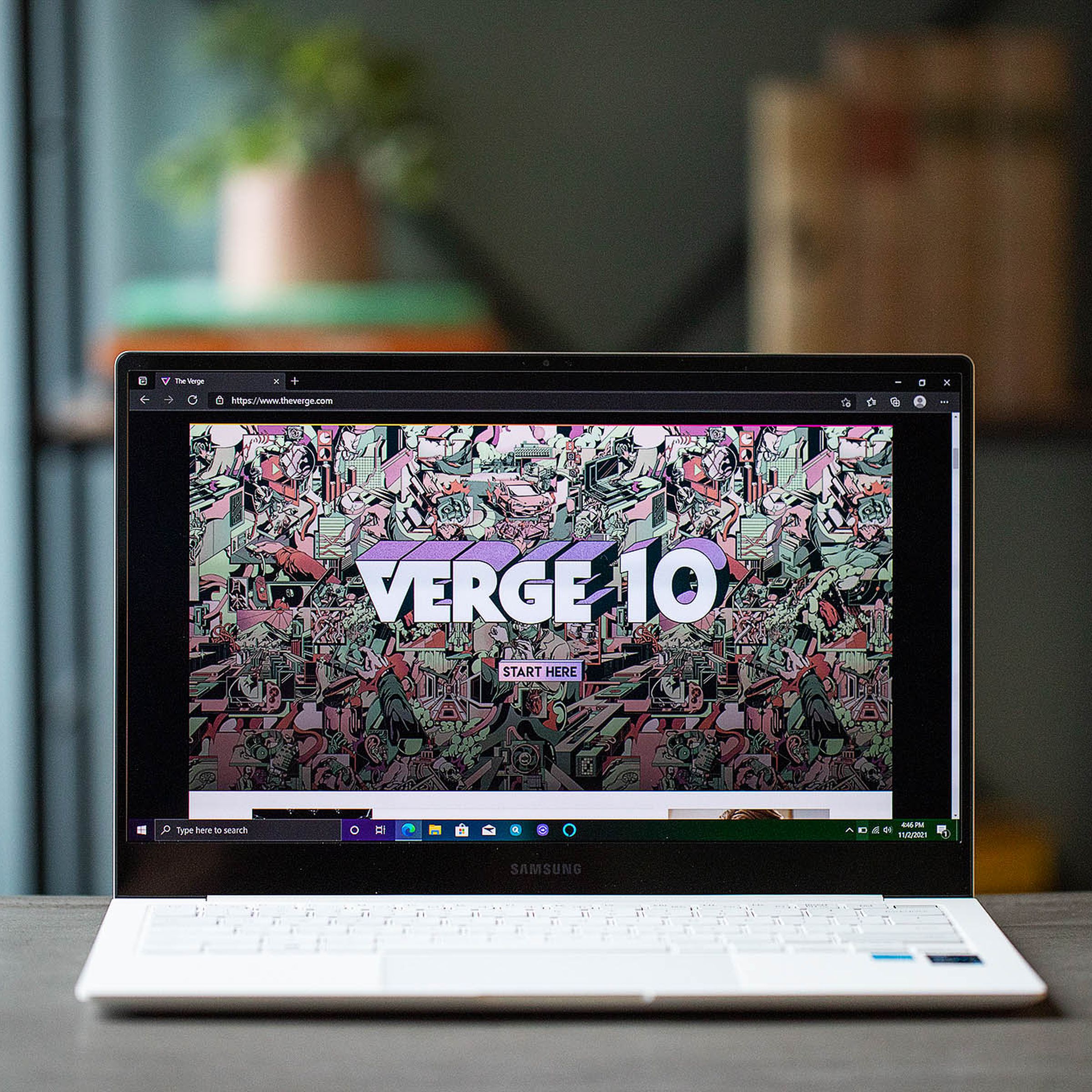The Samsung Galaxy Book Pro open, displaying the Verge 10 graphic.