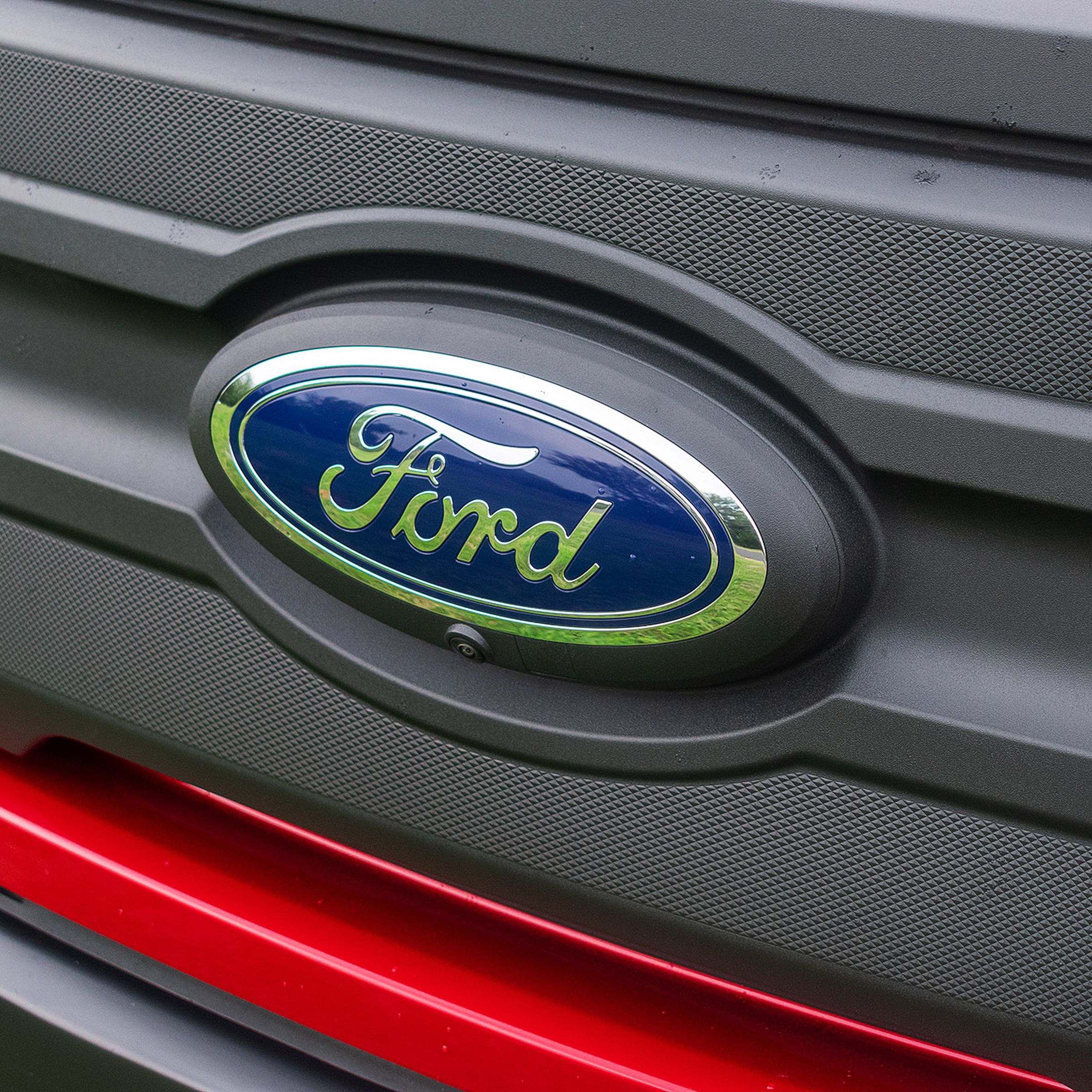 Ford logo on the front of an F-150 Lightning