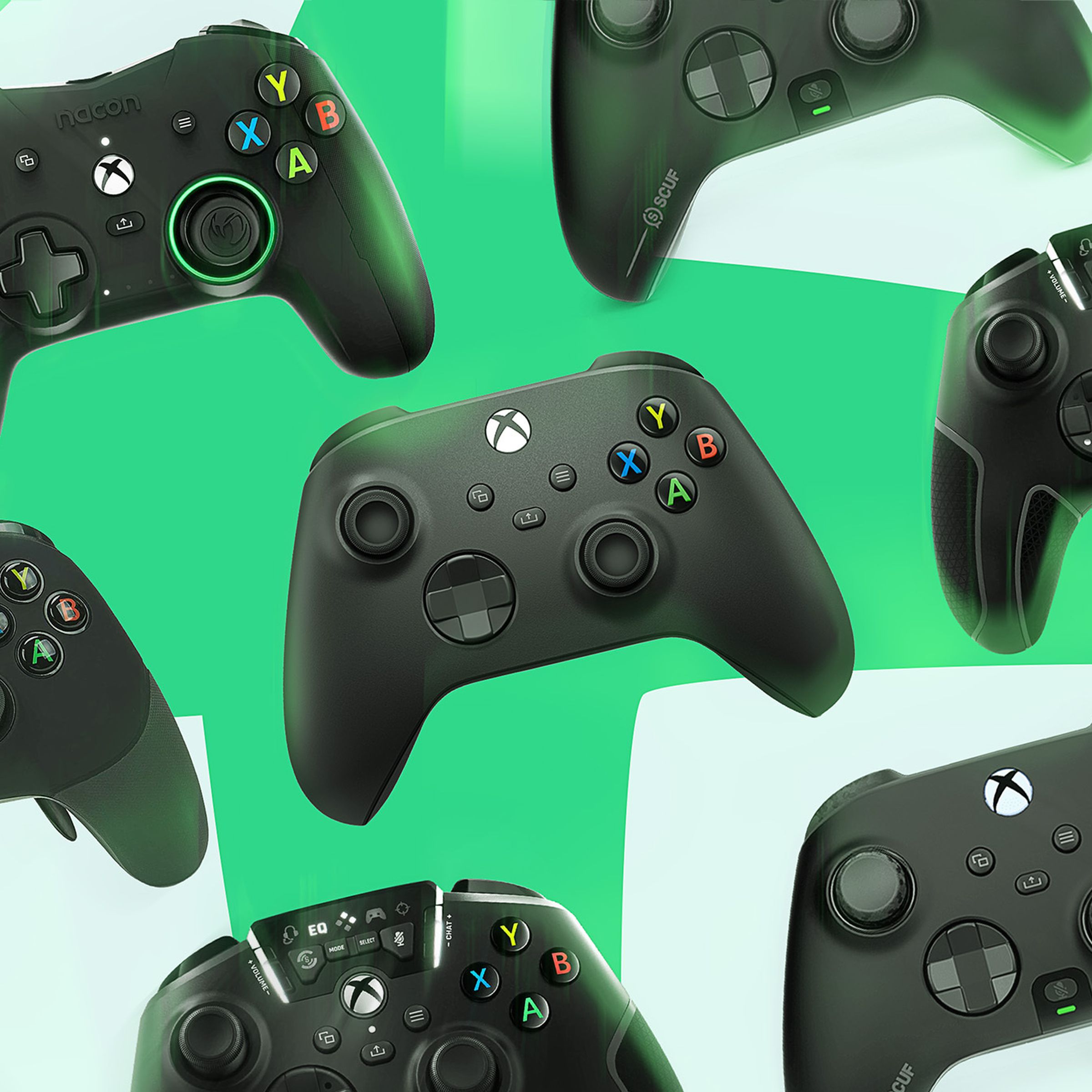 A collection of Xbox controllers.
