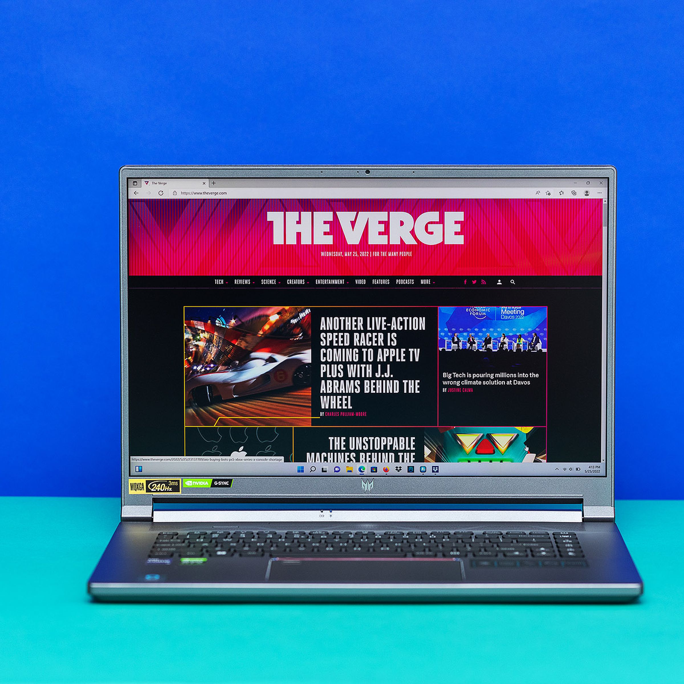 A front on photo of the Acer Predator Triton 500 SE gaming laptop on a blue background