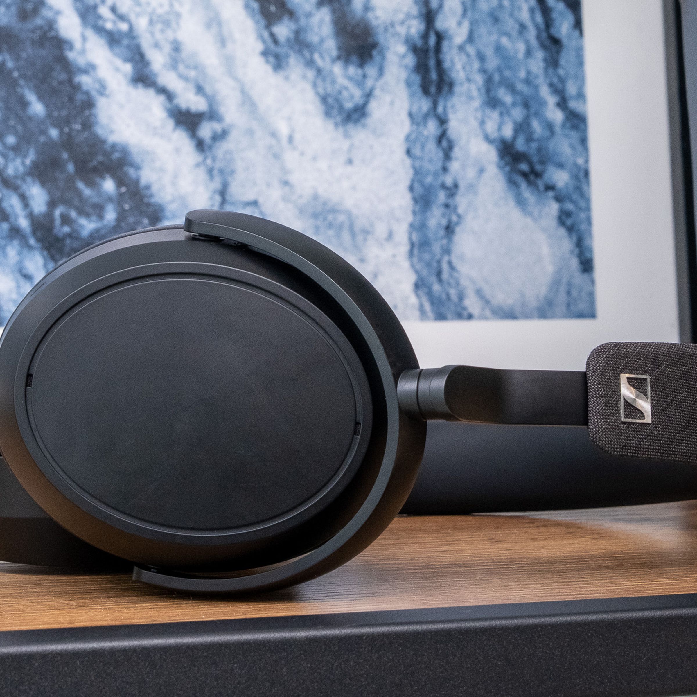 A photo of Sennheiser’s Momentum 4 Wireless headphones on a table.