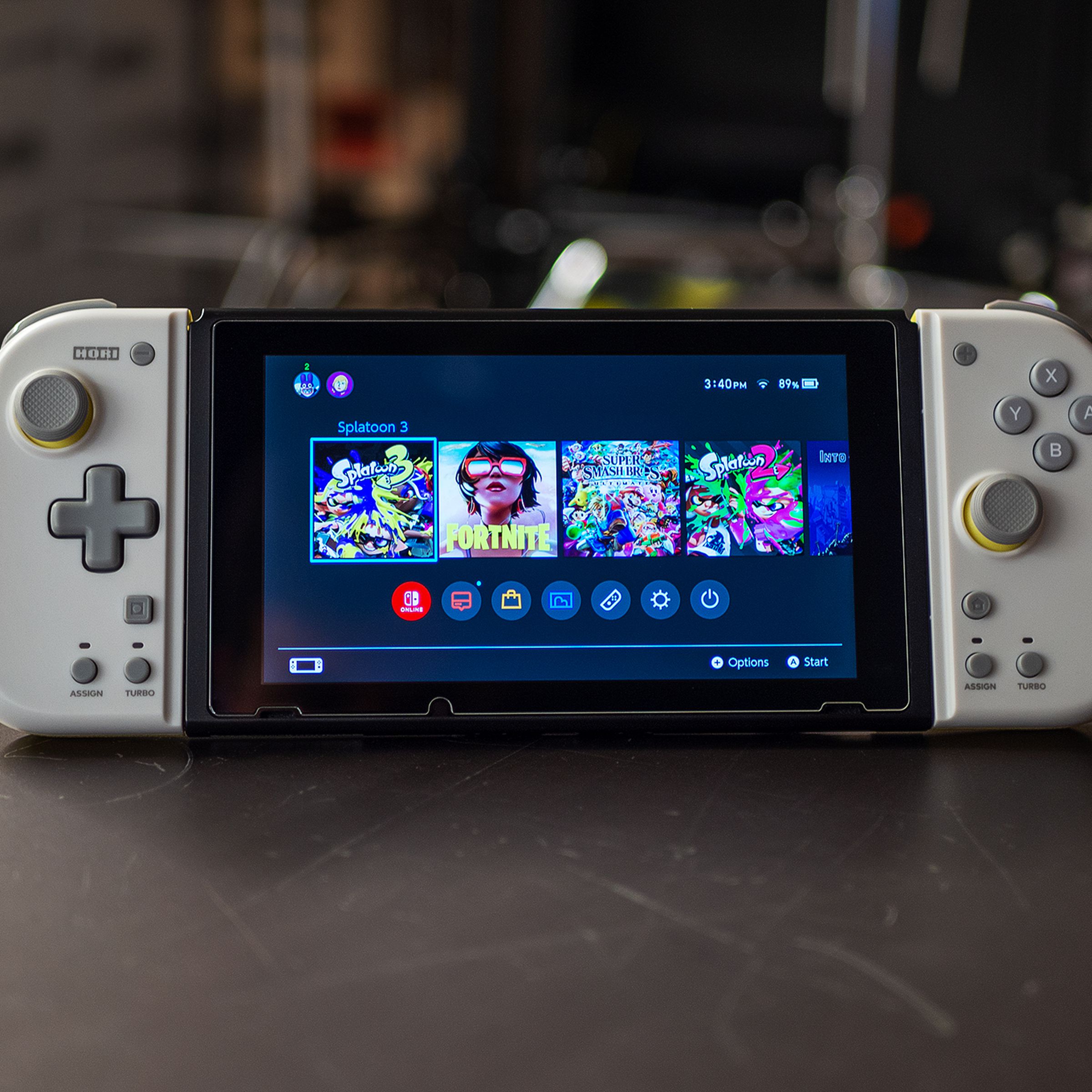 Nintendo Switch console shown with Hori’s Split Pad Compact controllers plugged in.