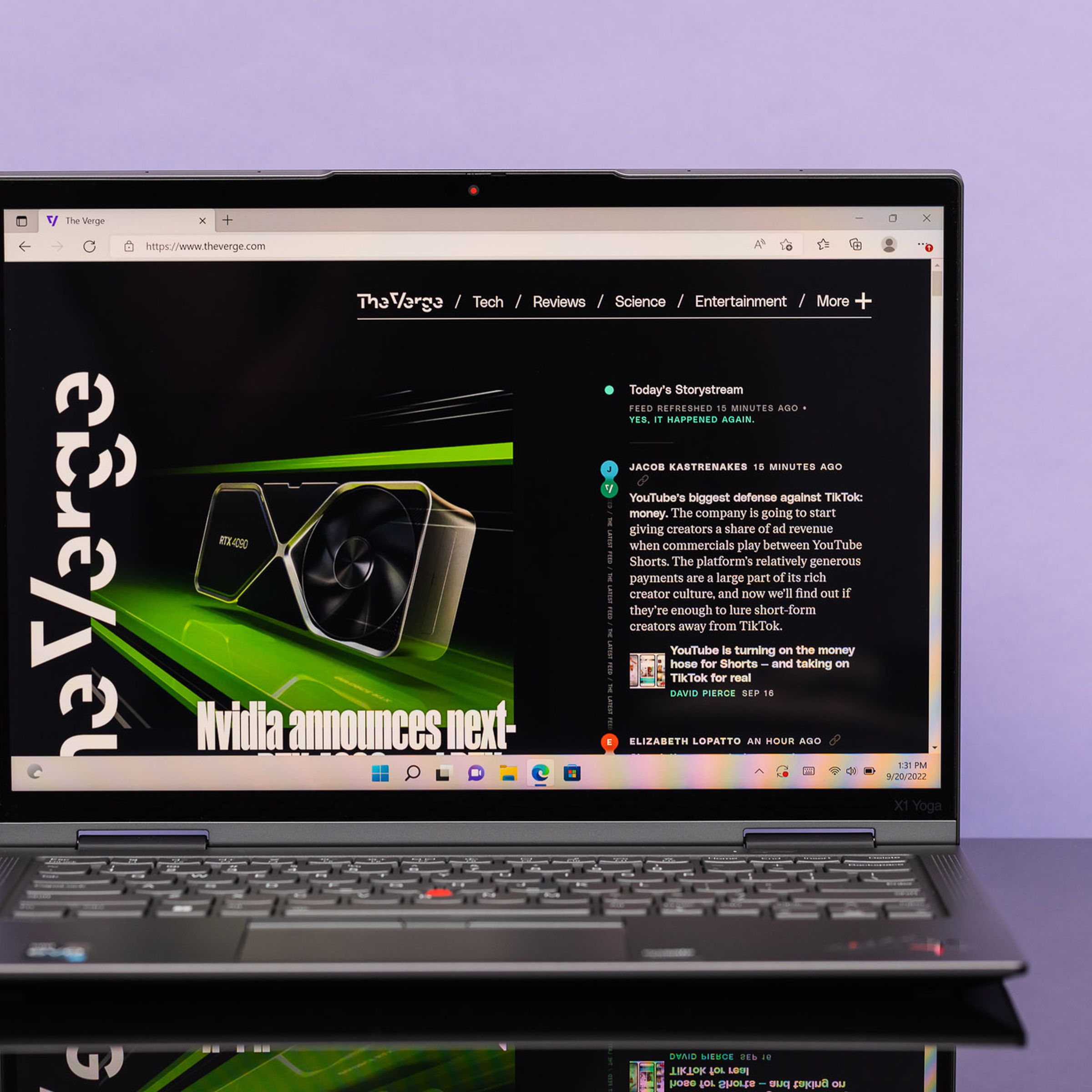The ThinkPad X1 YOga Gen 7 open, displaying The Verge homepage.