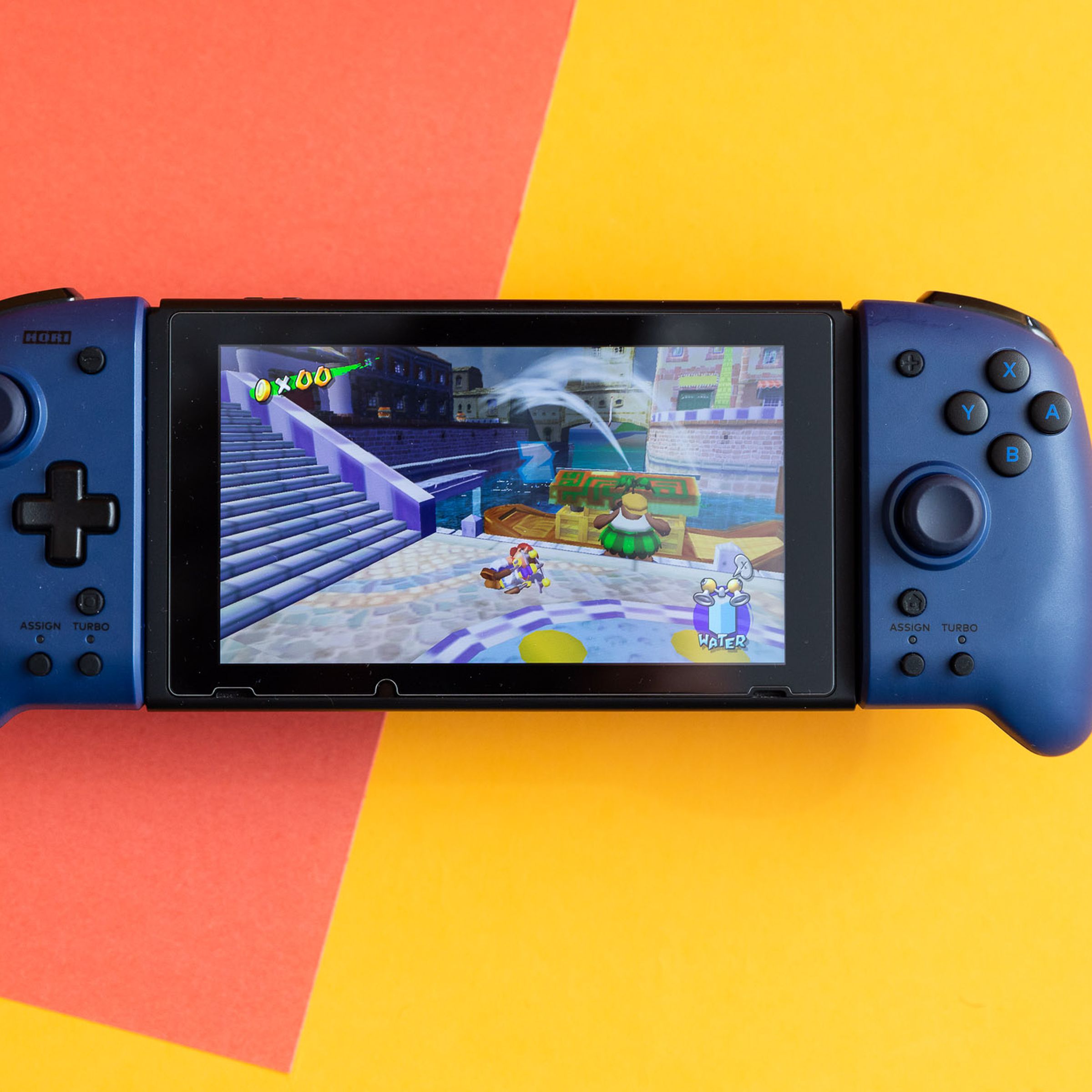 Hori’s Split Pad Pro are connected to a Nintendo Switch that is displaying Super Mario Sunshine.