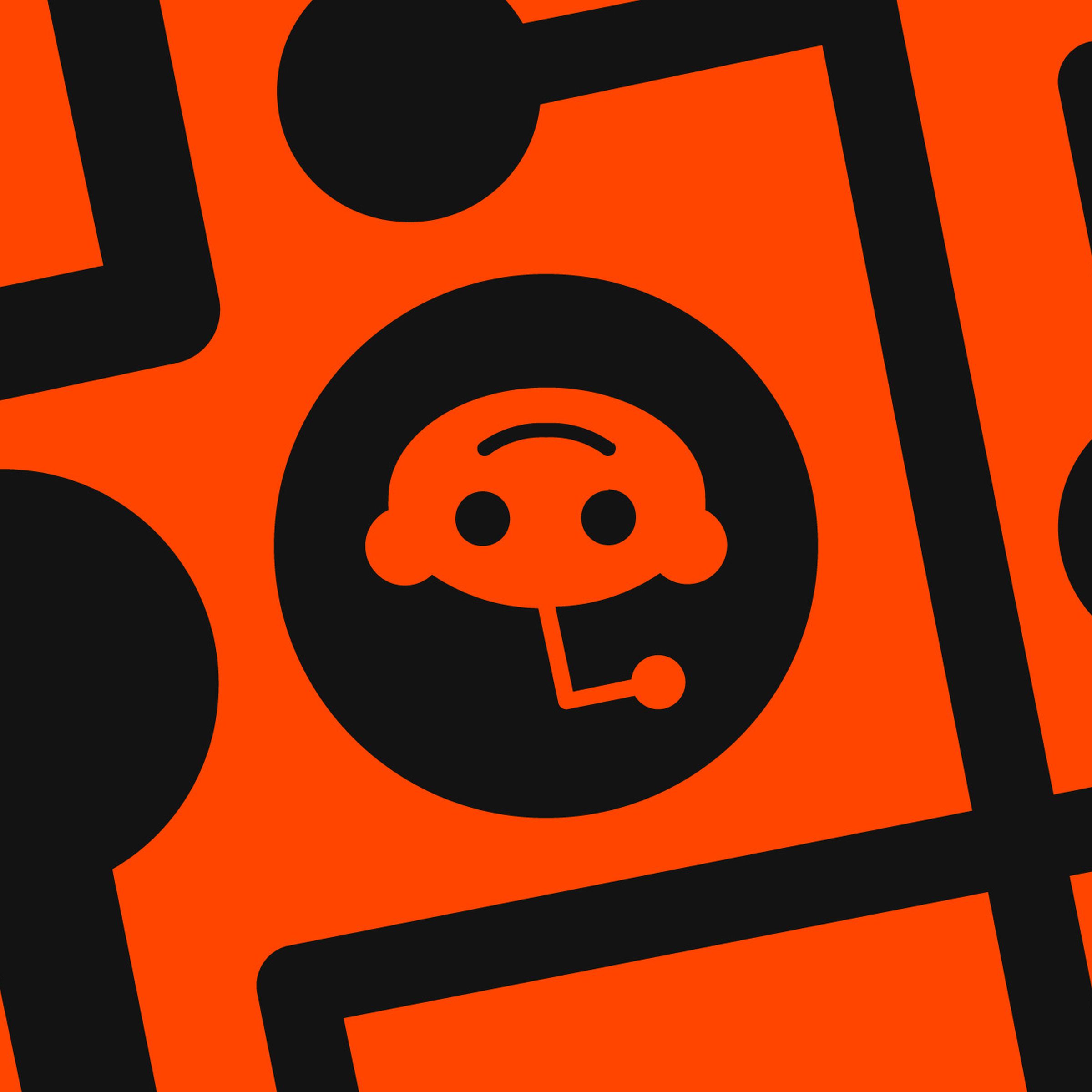 A Reddit logo shown upside down on an orange background.