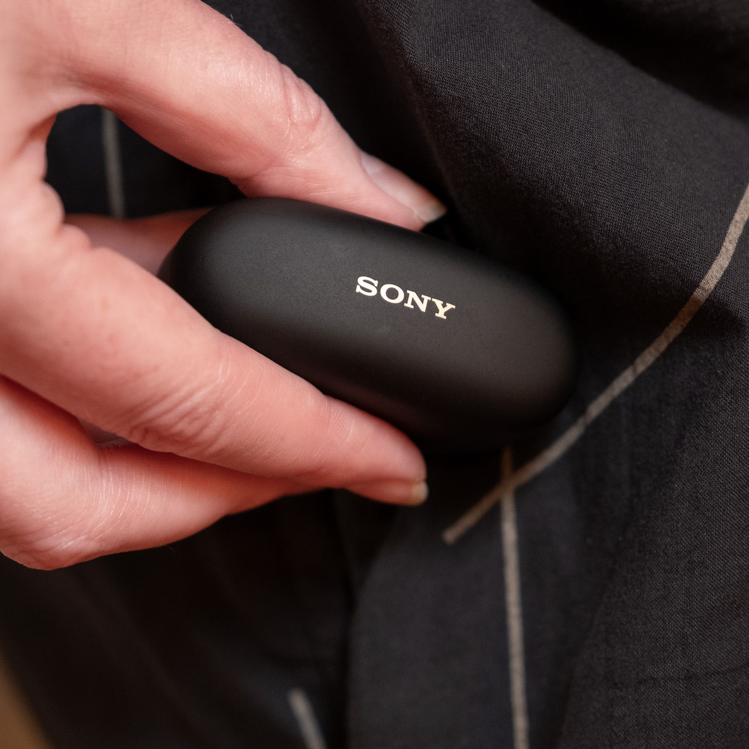 A photo of Sony’s WF-1000XM5 earbuds.