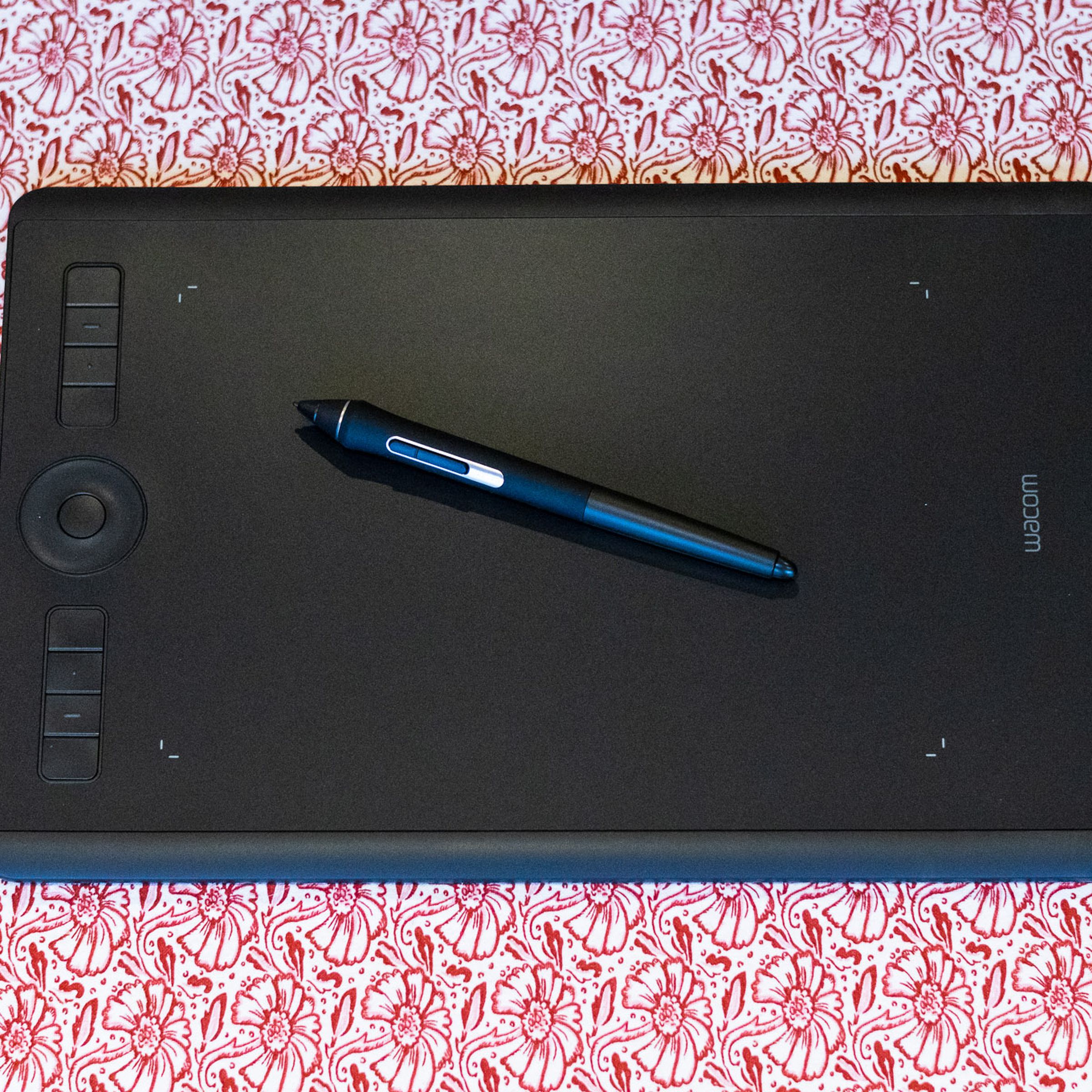The Wacom Intuos Pro (Medium) resting against a table.