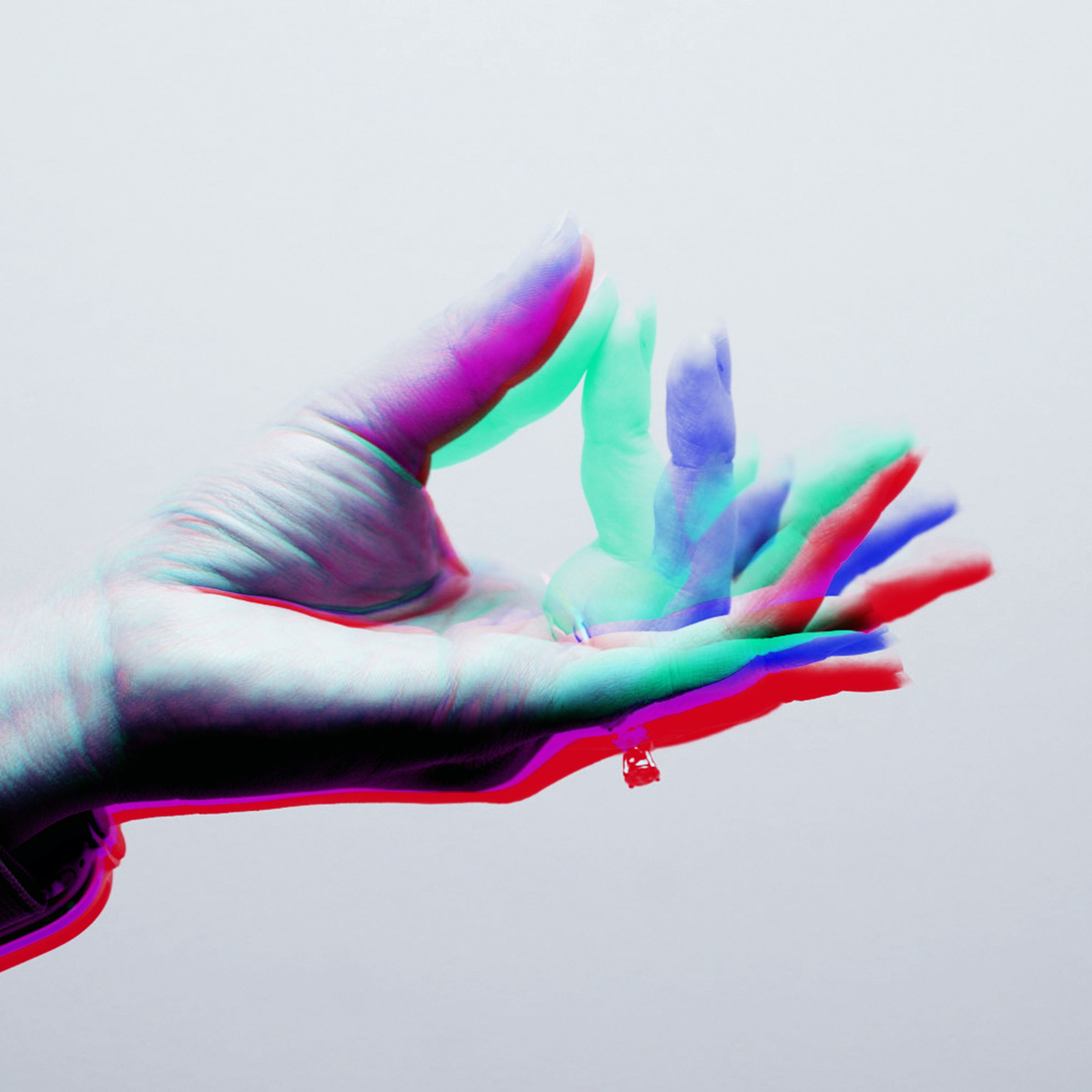 Stylized photo of person depiction the motion of the double tap gesture with the Apple Watch Ultra 2 on their wrist.