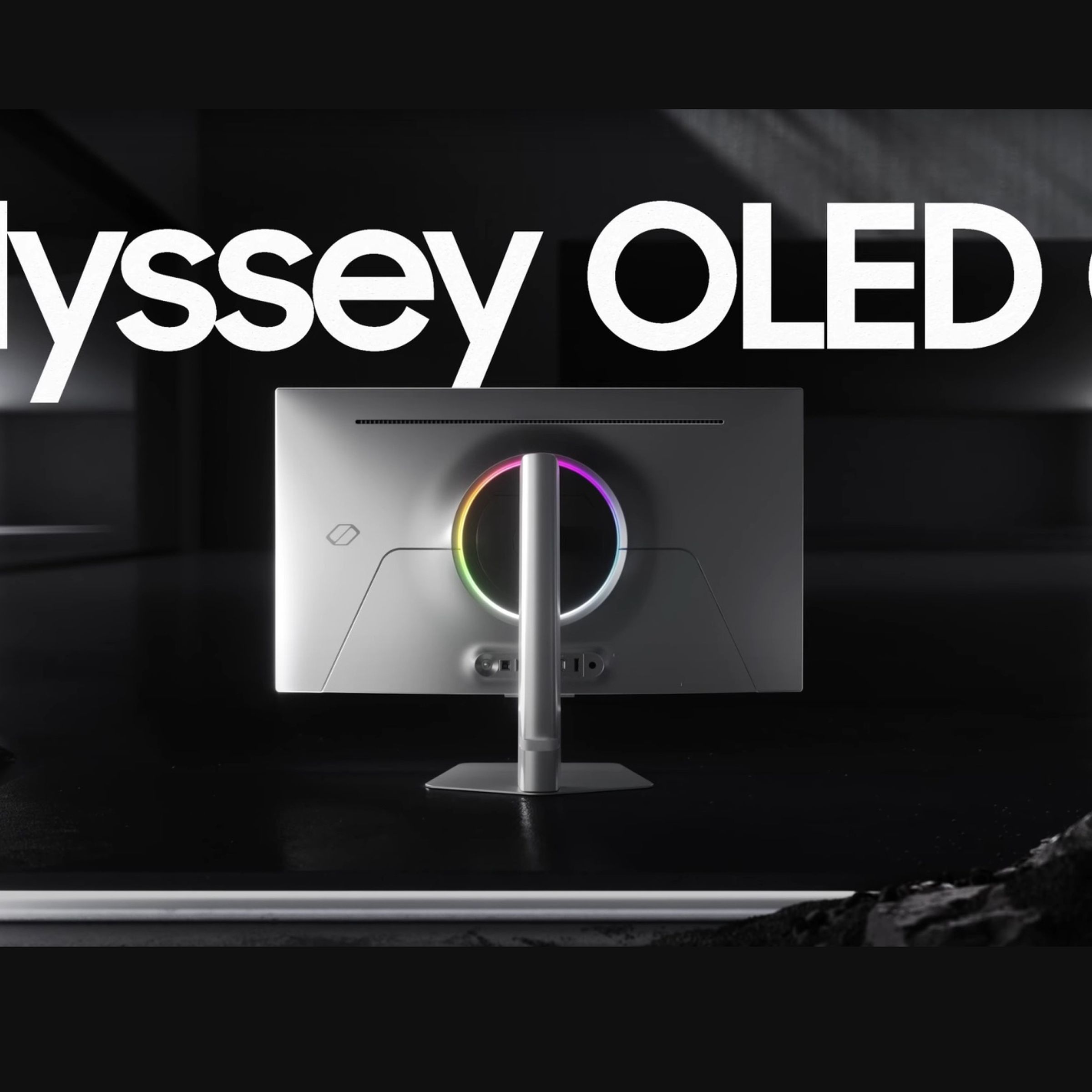 The Samsung Odyssey OLED G8 in a dimly lit room.