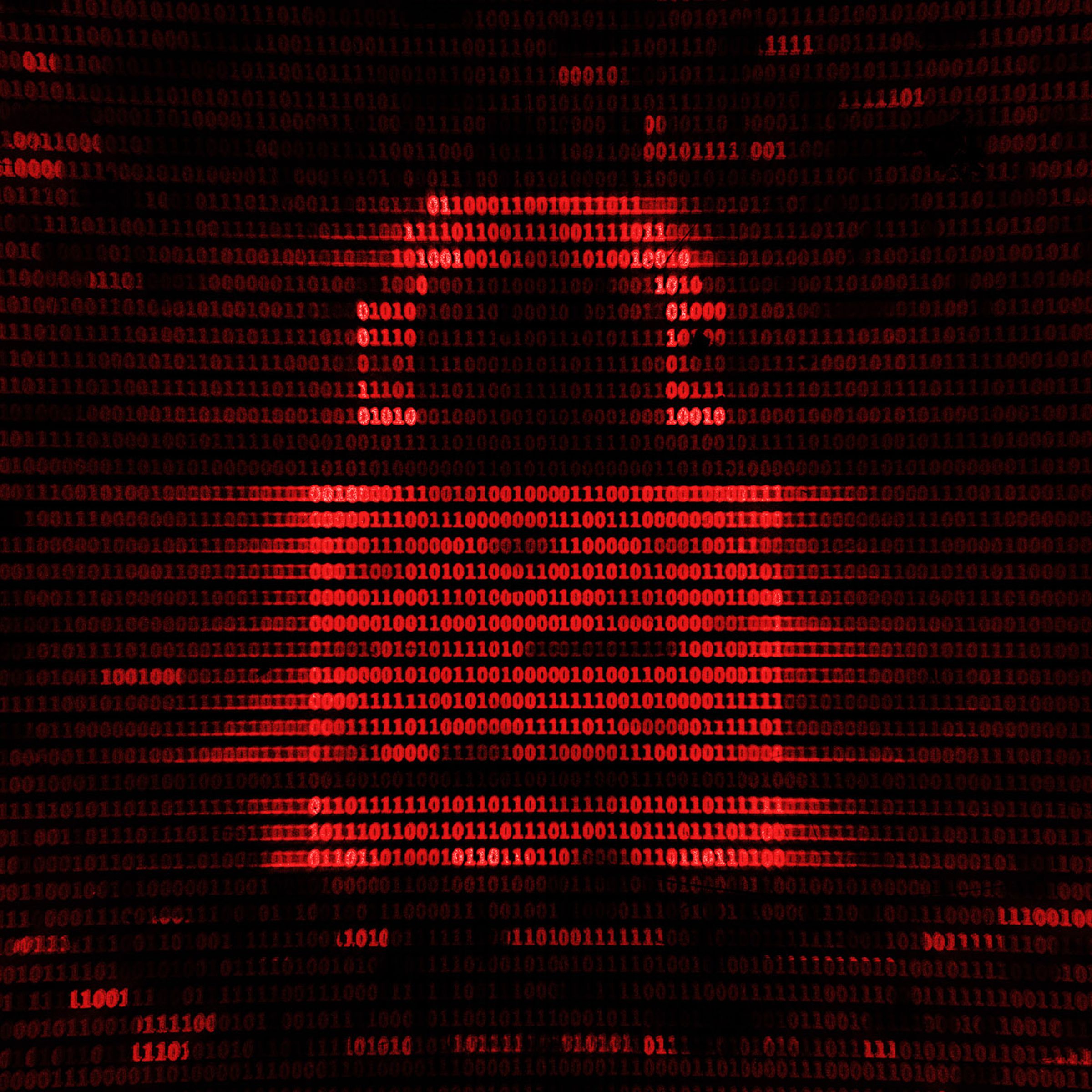 An image showing a red lock made up of code