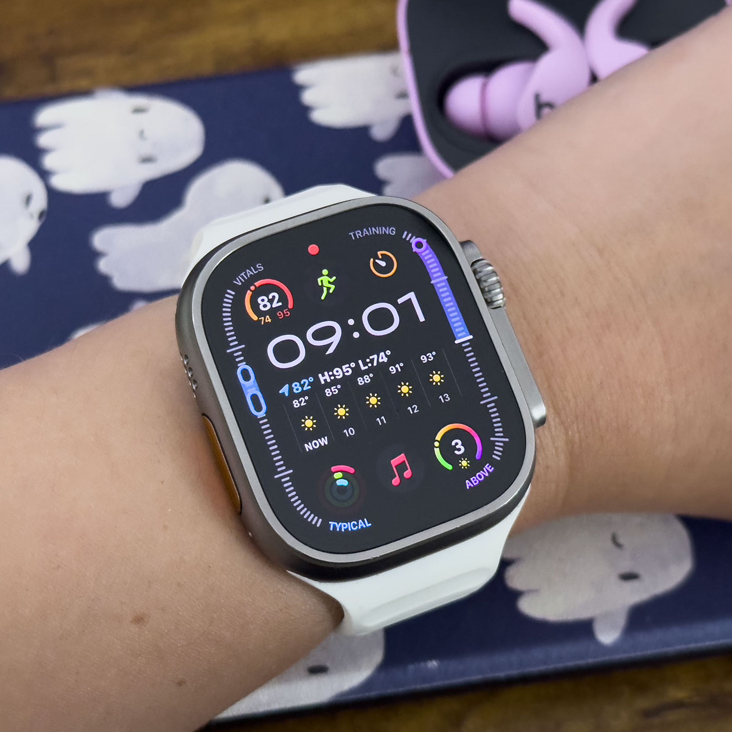 Close-up of person wearing Apple Watch Ultra 2 with watchOS 11