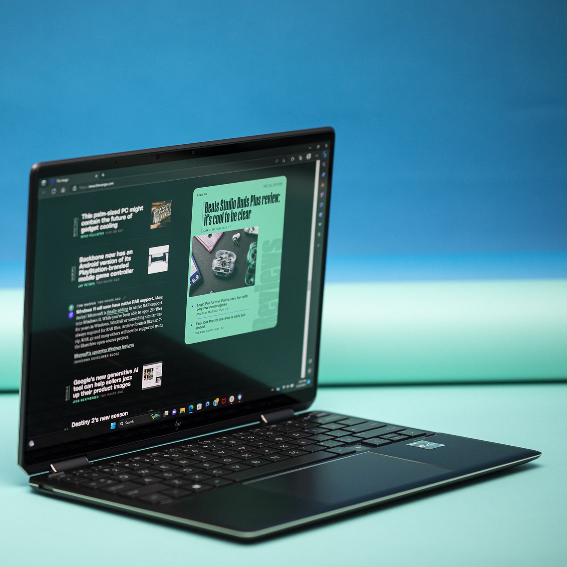 The HP Spectre x360 displaying The Verge homepage.