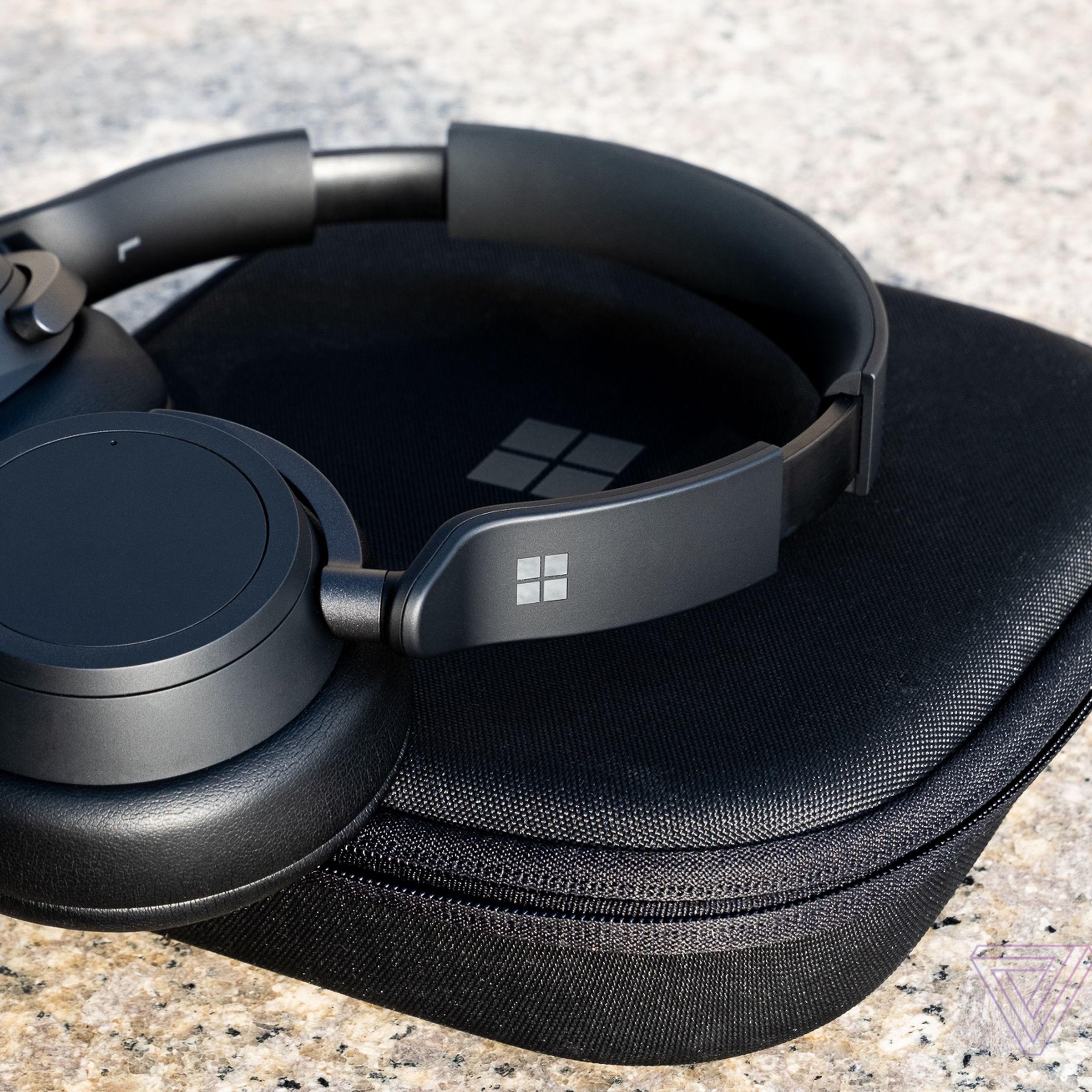 The Surface Headphones 2 pictured on their carrying case.