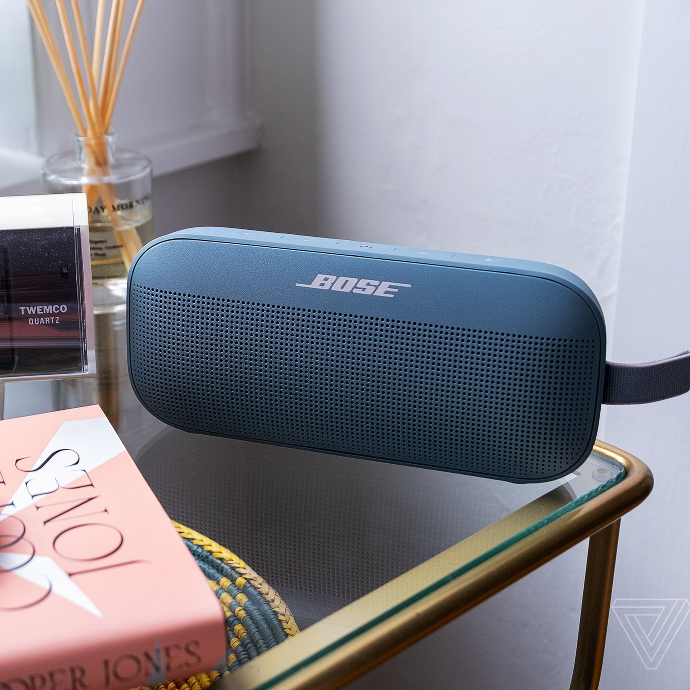 A photo of the Bose SoundLink Flex on a bedside table.