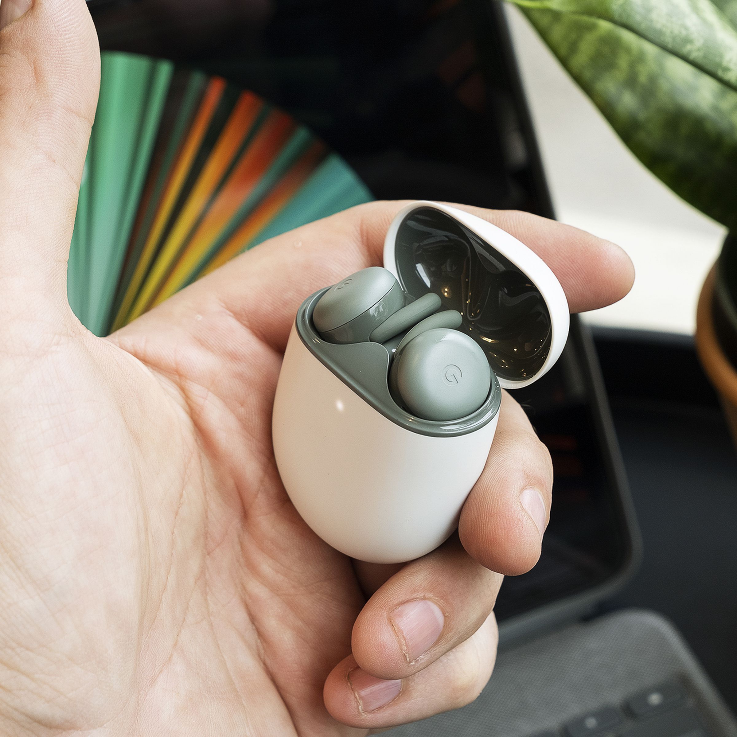 The new Pixel Buds A are available in a dark green color
